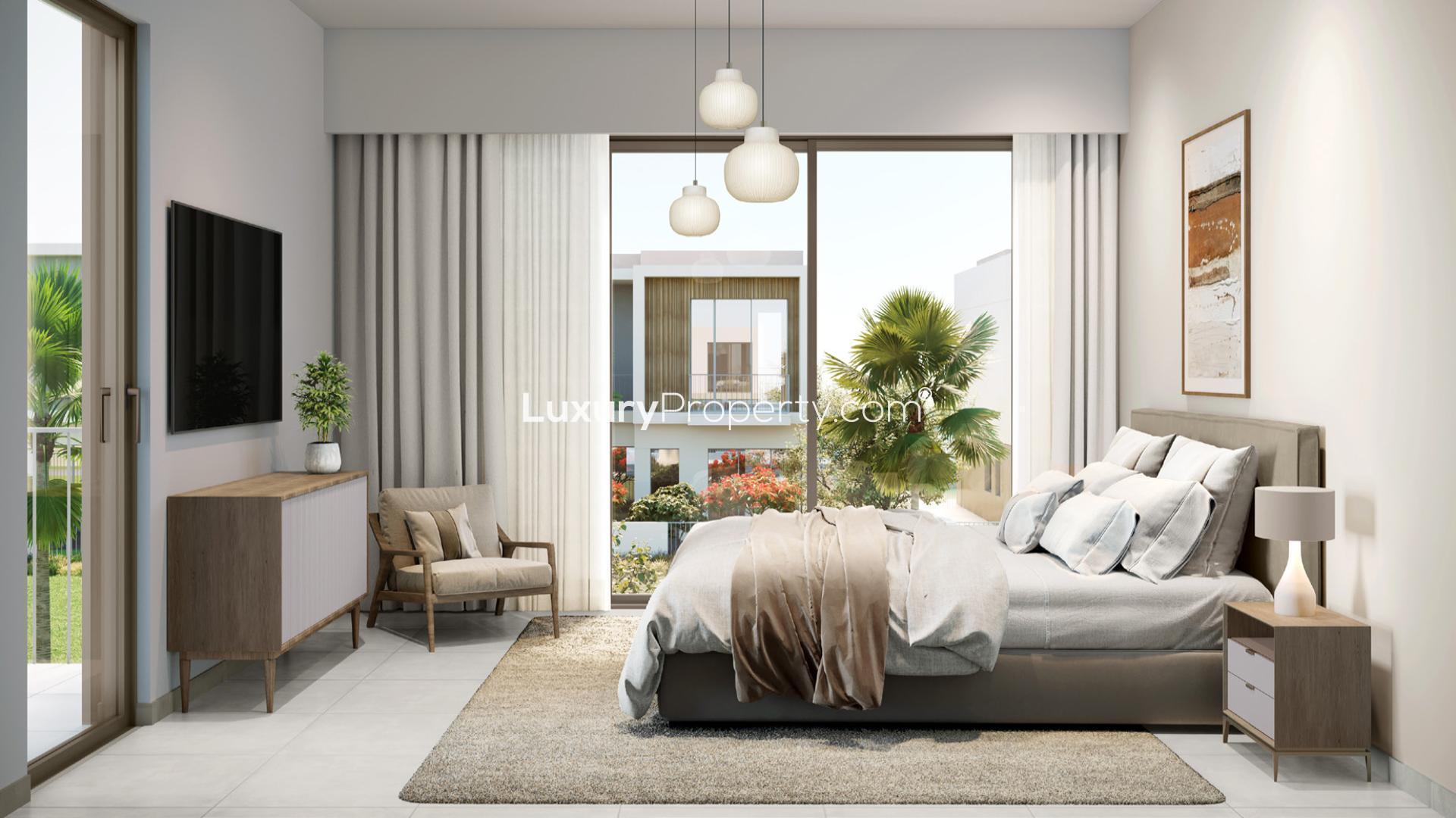 Contemporary open-plan living area in Orania townhouse, The Valley, Dubai, featuring modern decor