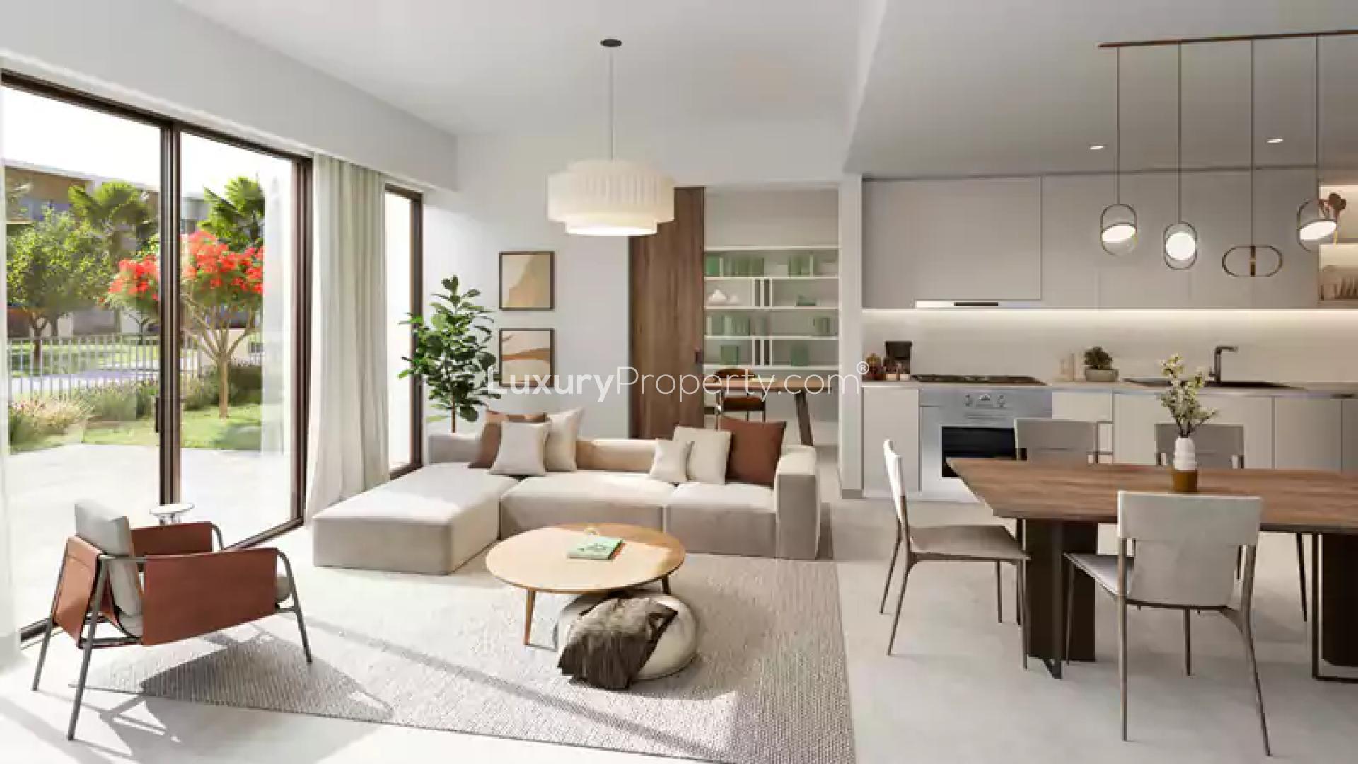 Modern living and dining area in Orania townhouse, The Valley, for sale