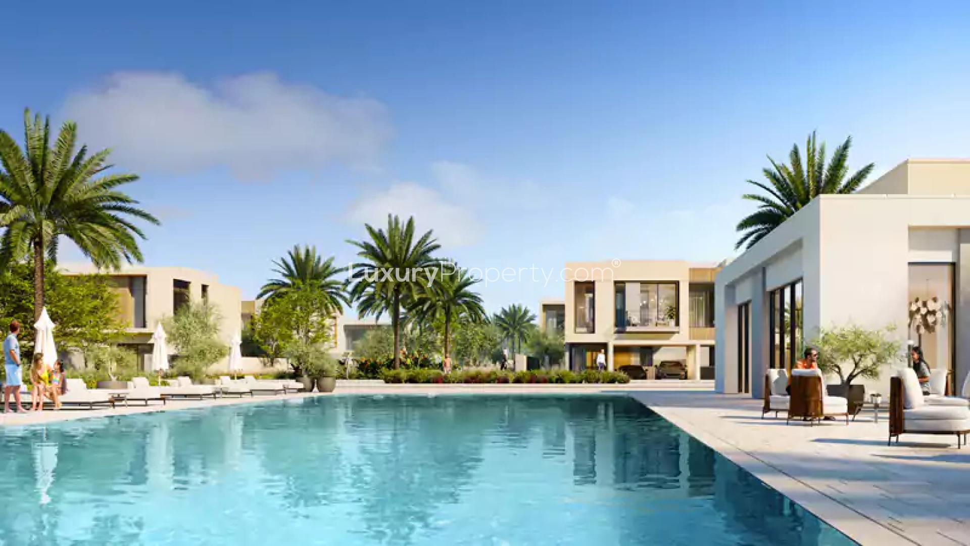 Modern living room and kitchen in Orania townhouse, The Valley, with garden view