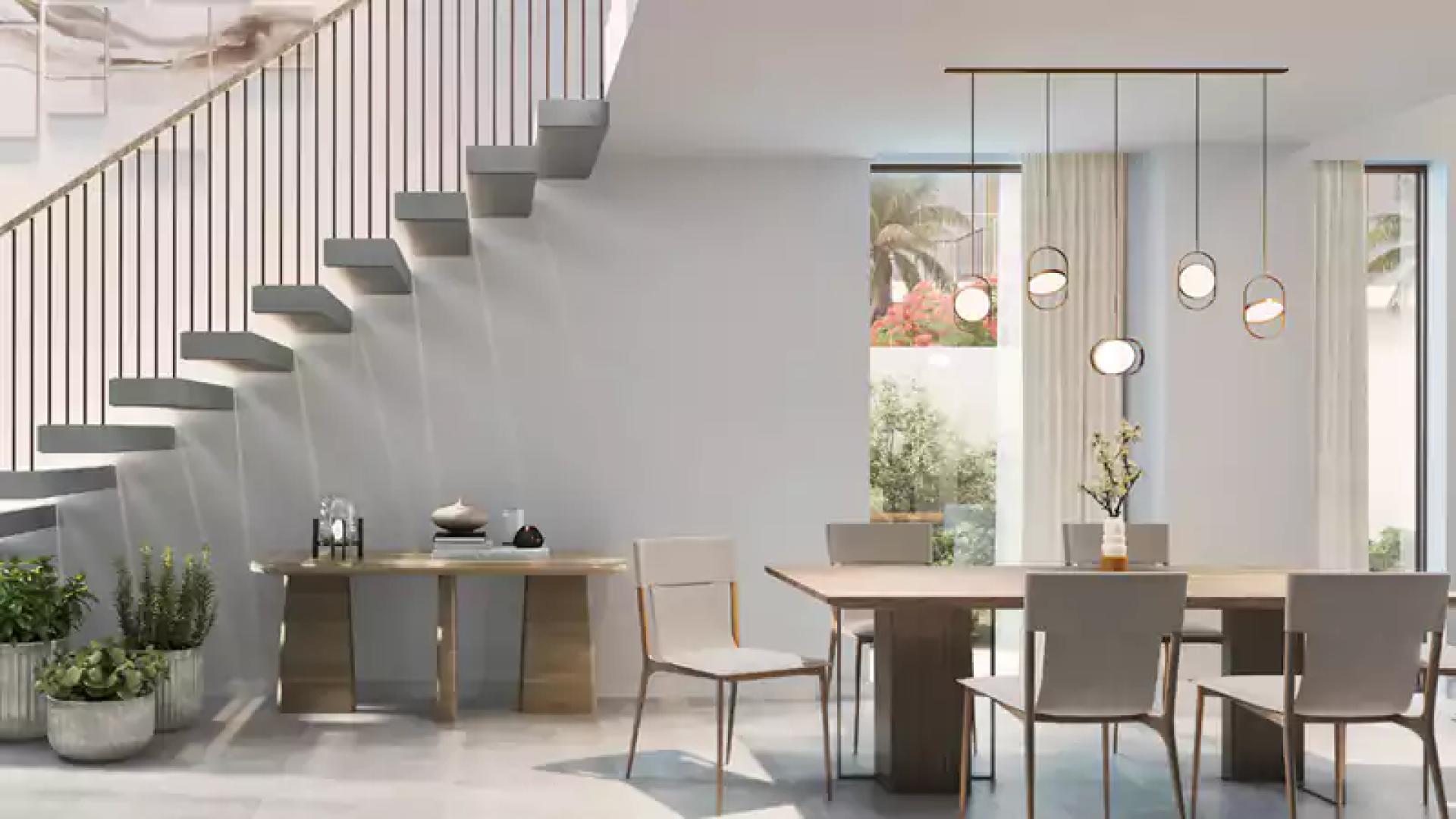 Modern living room in Orania townhouse, The Valley, with large windows and stylish decor