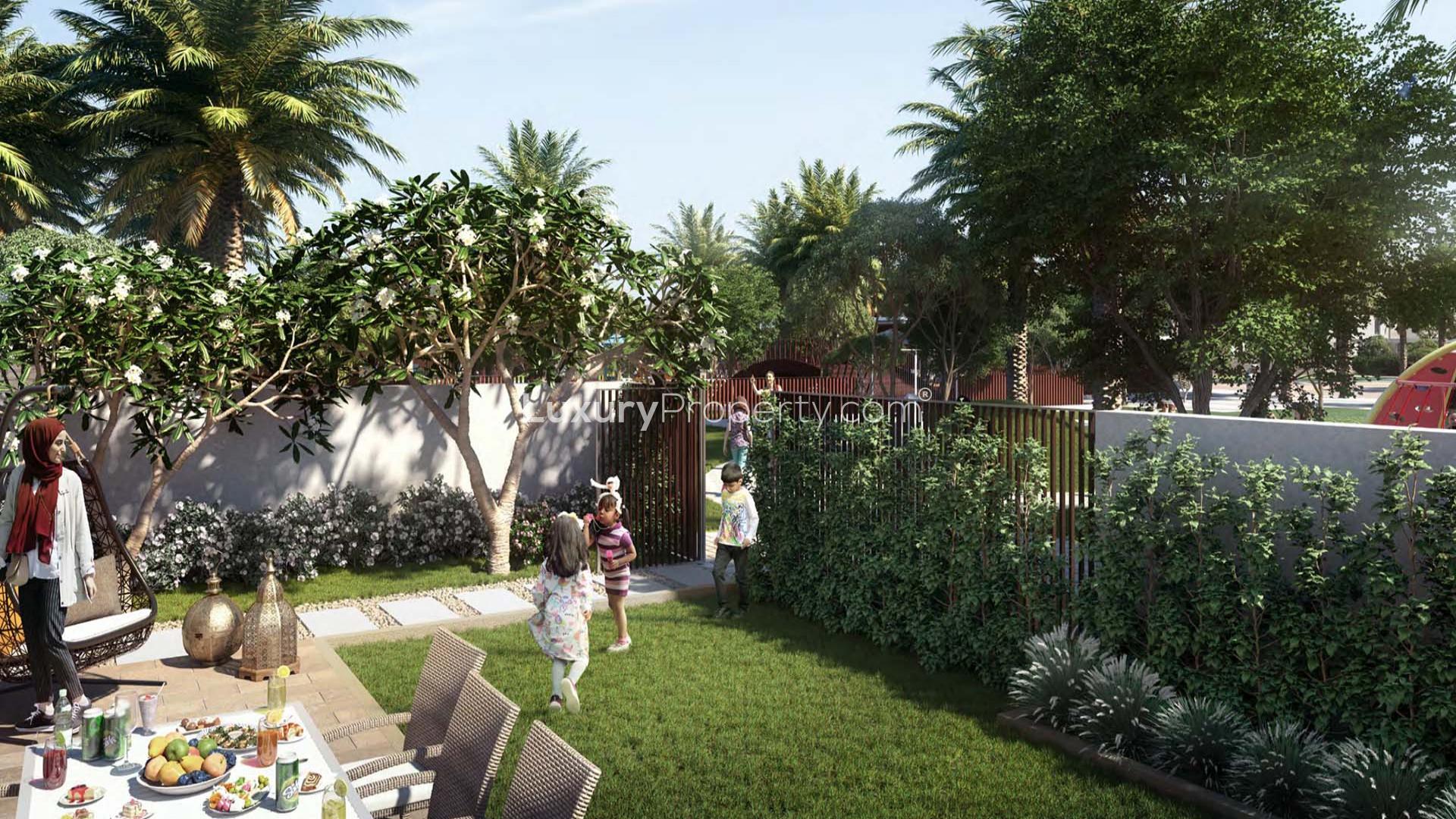 Park view from single-row townhouse in Arabian Ranches 3, Ruba community, lush greenery and pathways