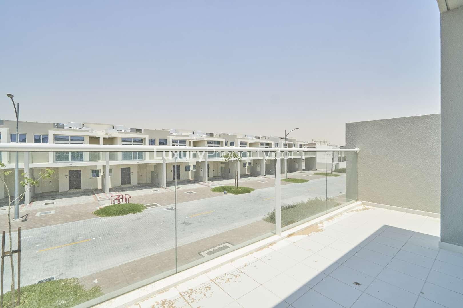 Balcony view of modern townhouse in Albizia Damac Hills 2, Akoya community