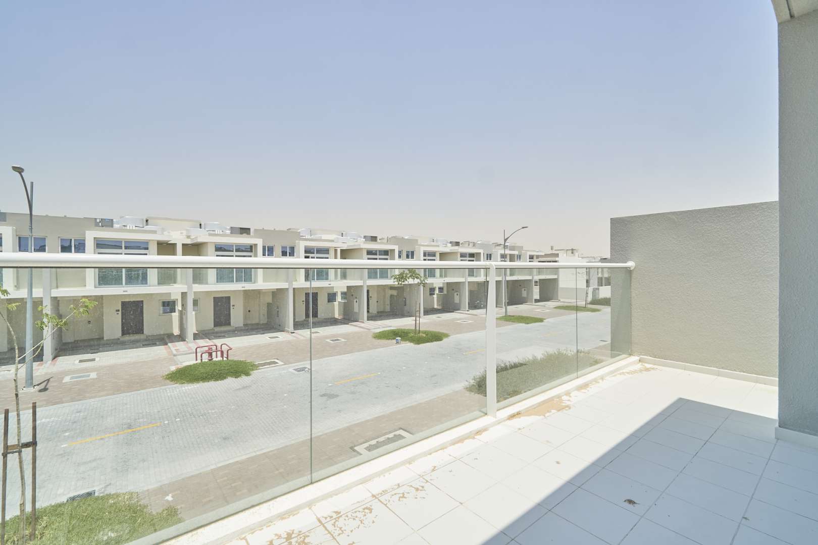 Balcony view of modern townhouse in Albizia Damac Hills 2, Akoya community