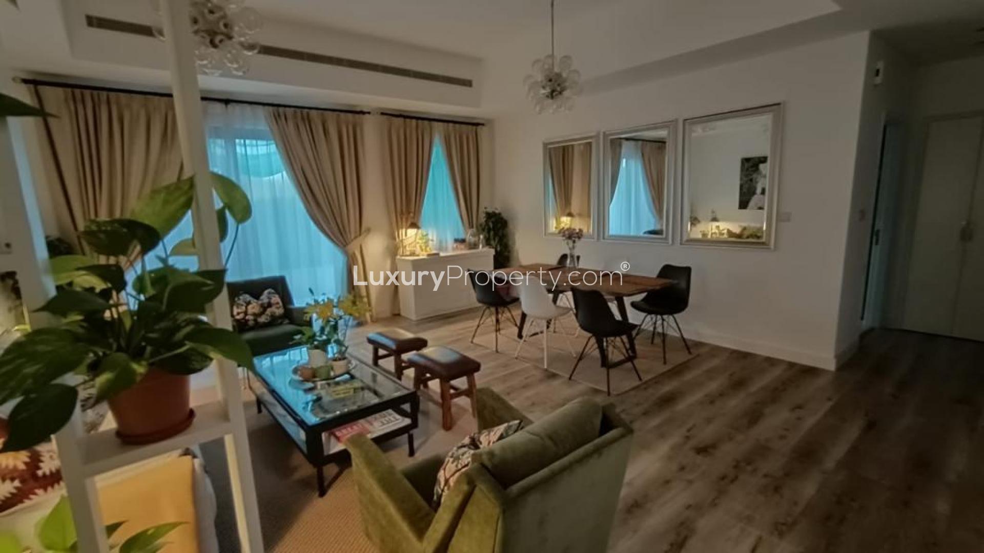 Modern living and dining area in Mira townhouse, Reem community, spacious and elegantly furnished