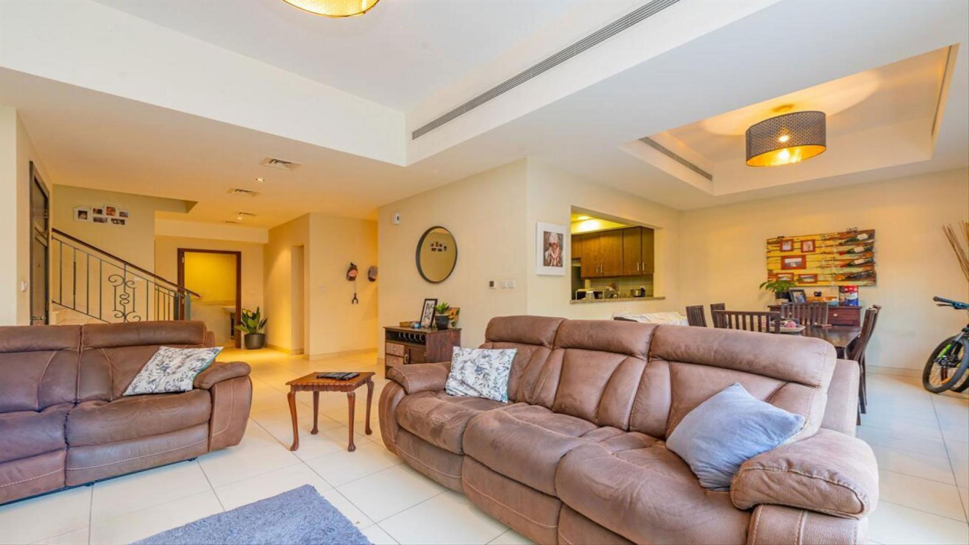 Stylish 3-bed villa exterior with driveway in Mira 2, Reem community, for sale
