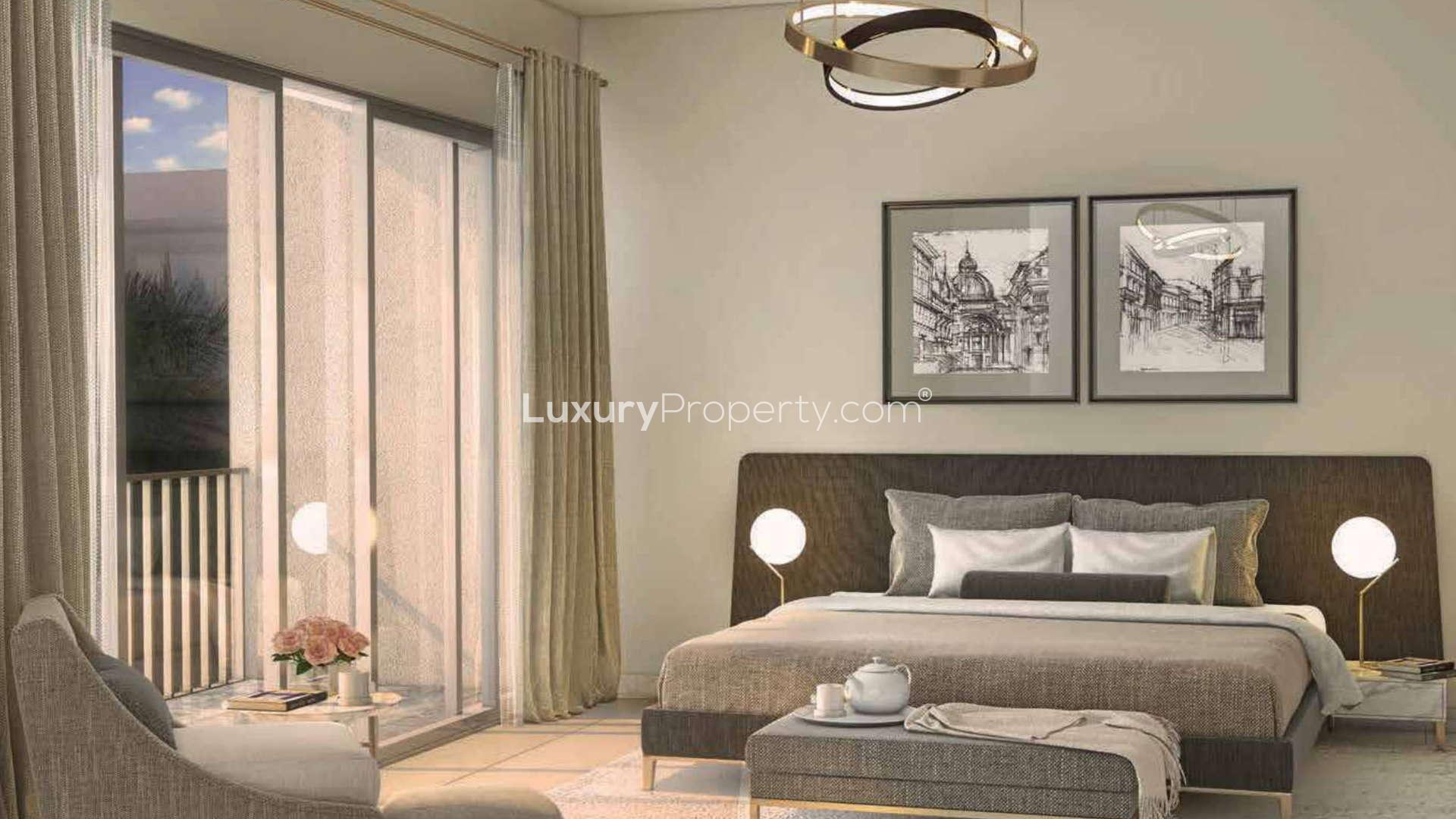 Aerial view of Arabella 3 townhouses in Mudon, Dubailand, showcasing community layout and greenery