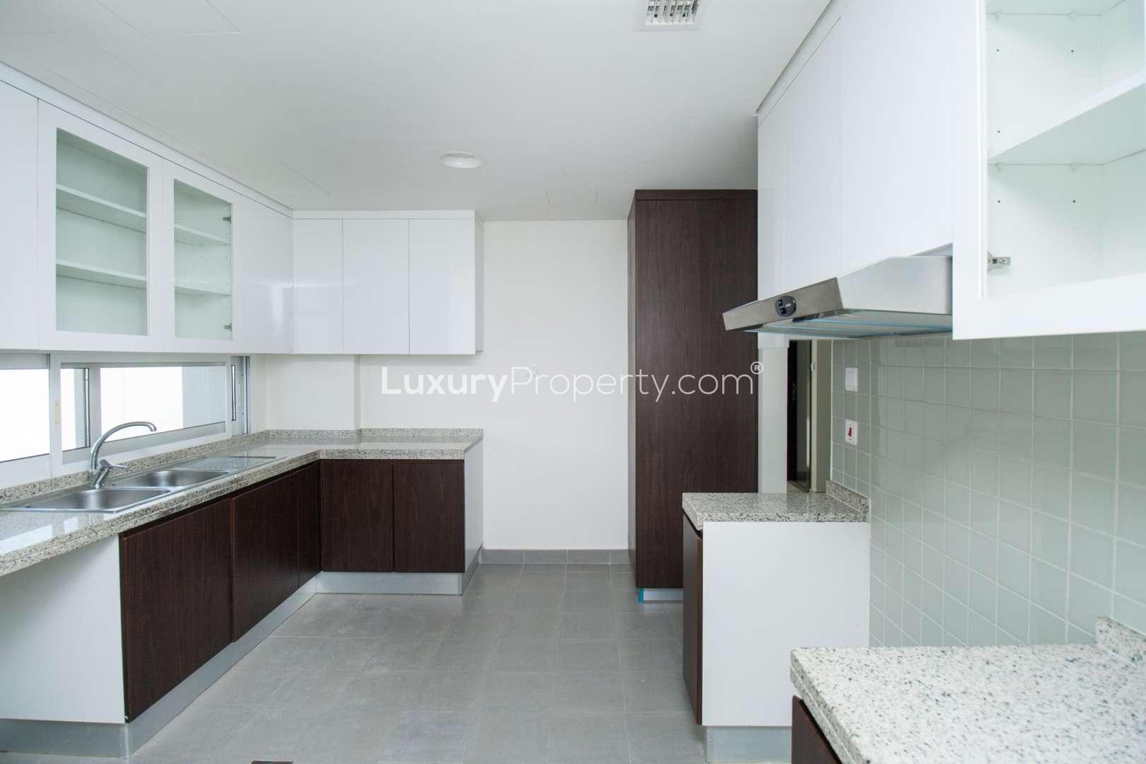 Modern kitchen in spacious 3-bedroom townhouse for sale, Arabella 1, Mudon