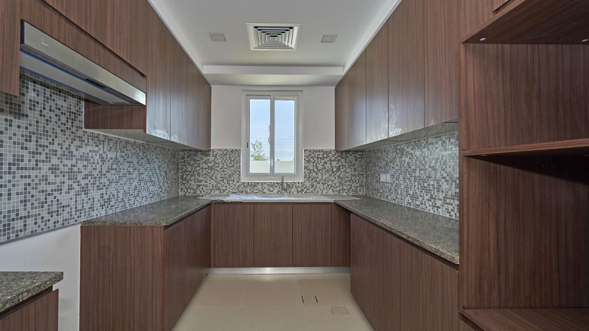 Bright living room with large windows in Arabella Townhouses, Mudon villa for sale