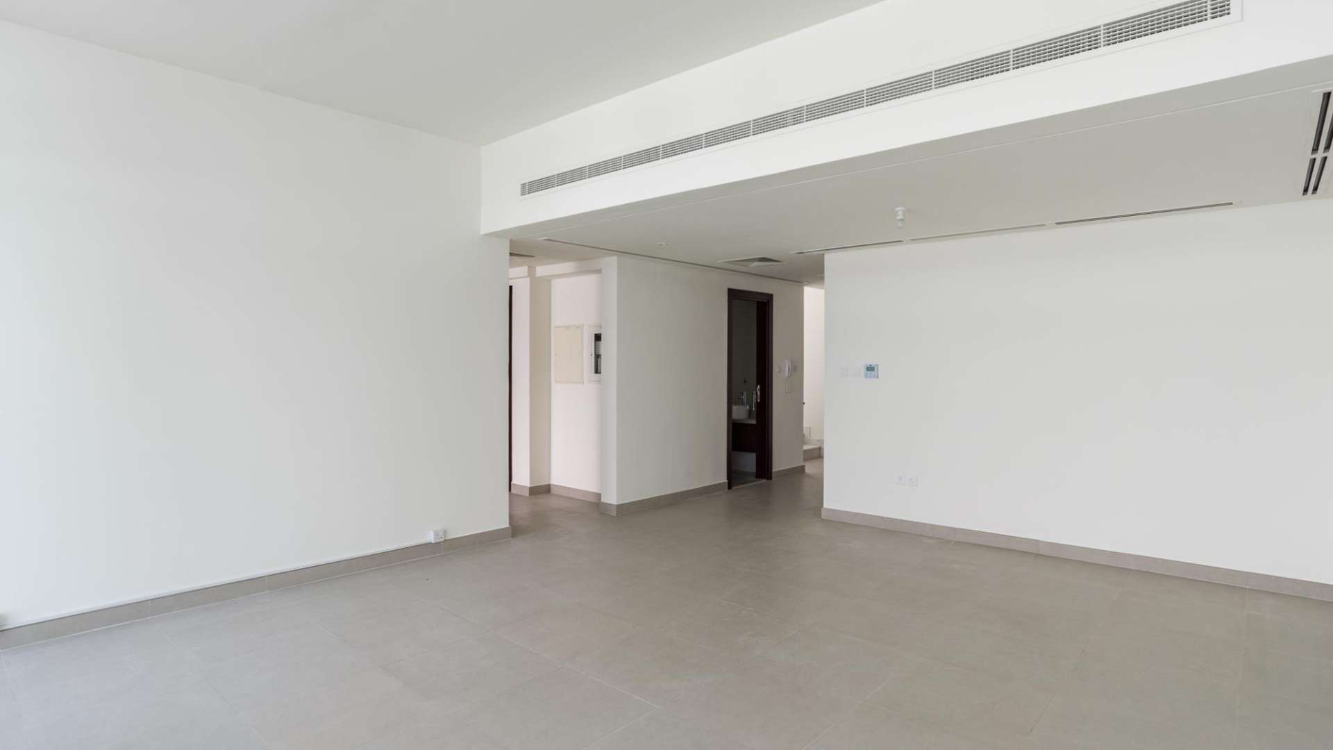 Spacious living room in Arabella Townhouses, Mudon, 3-bedroom villa for sale