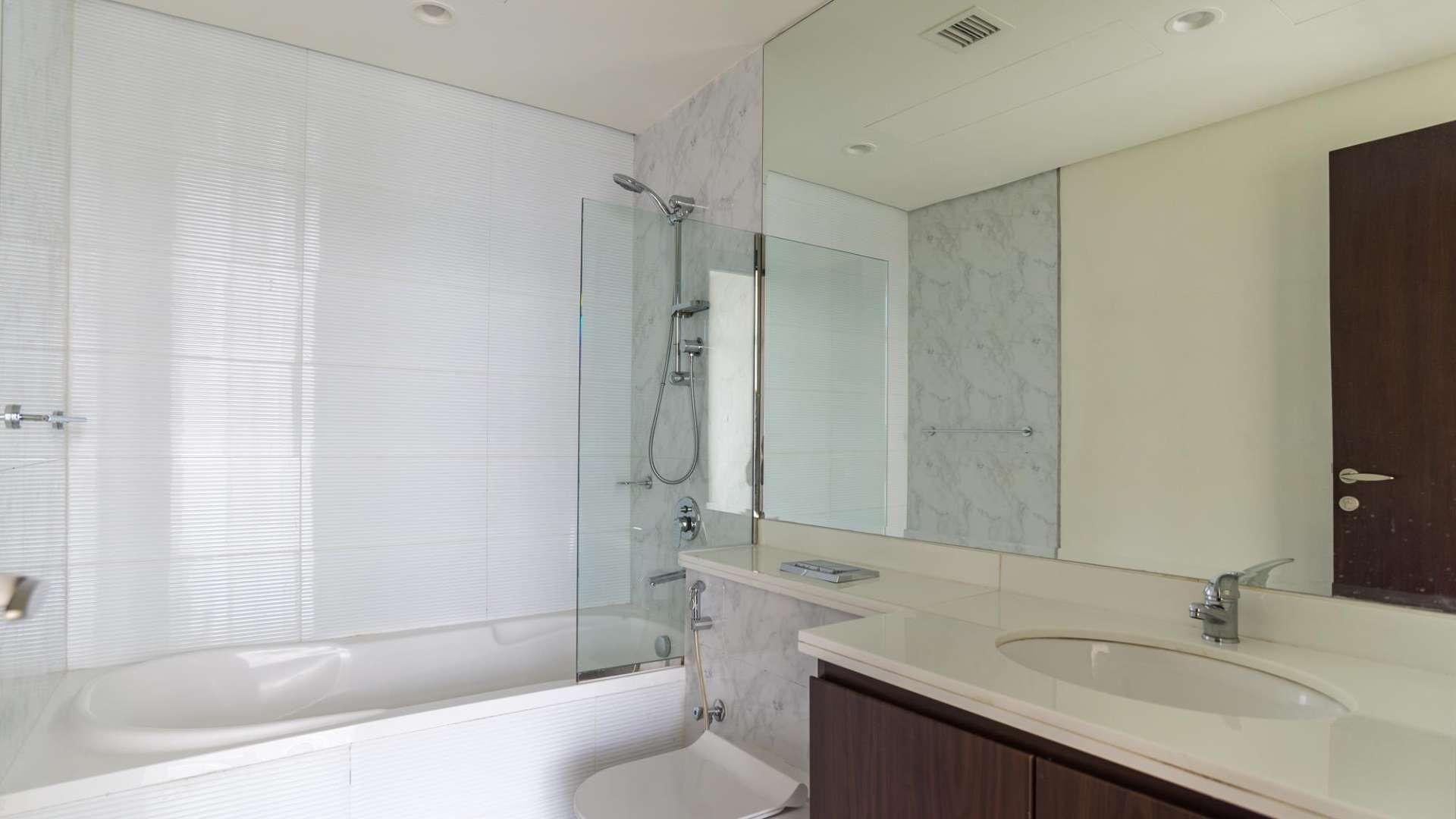 Contemporary Arabella townhouse balcony view, Mudon community, showcasing modern design and outdoor space