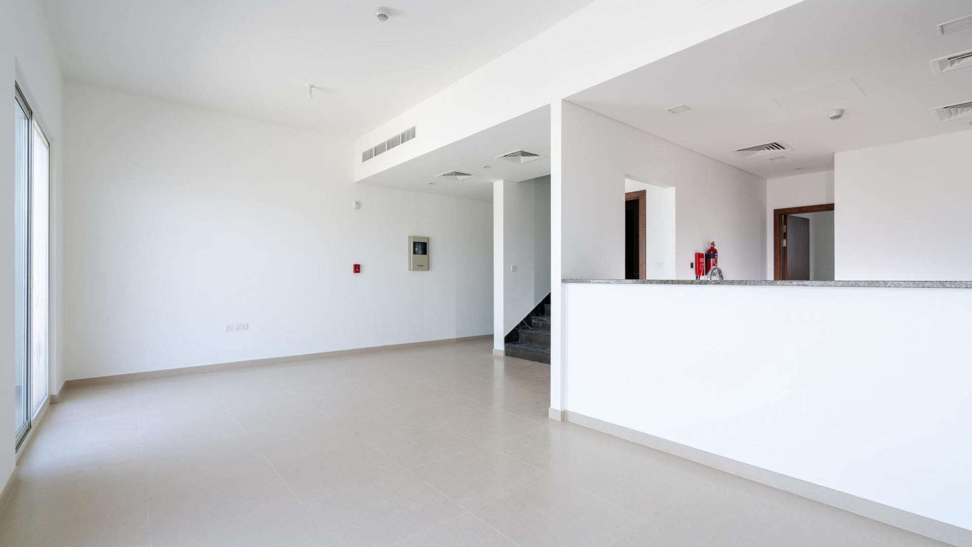 Spacious living area in 3-bedroom villa, Arabella Townhouses, Mudon, Dubai