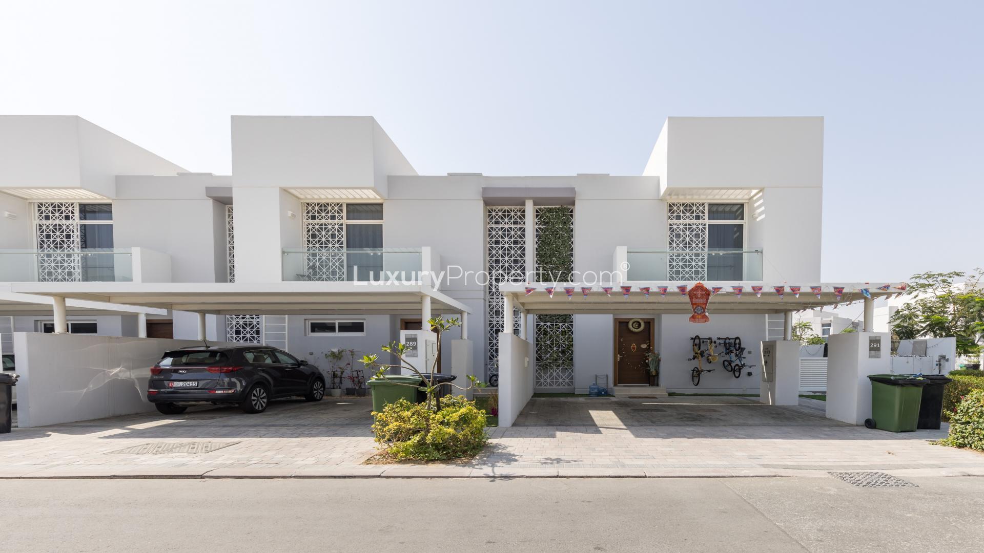 Spacious patio of 3-bedroom townhouse in Arabella, Mudon with modern outdoor furniture