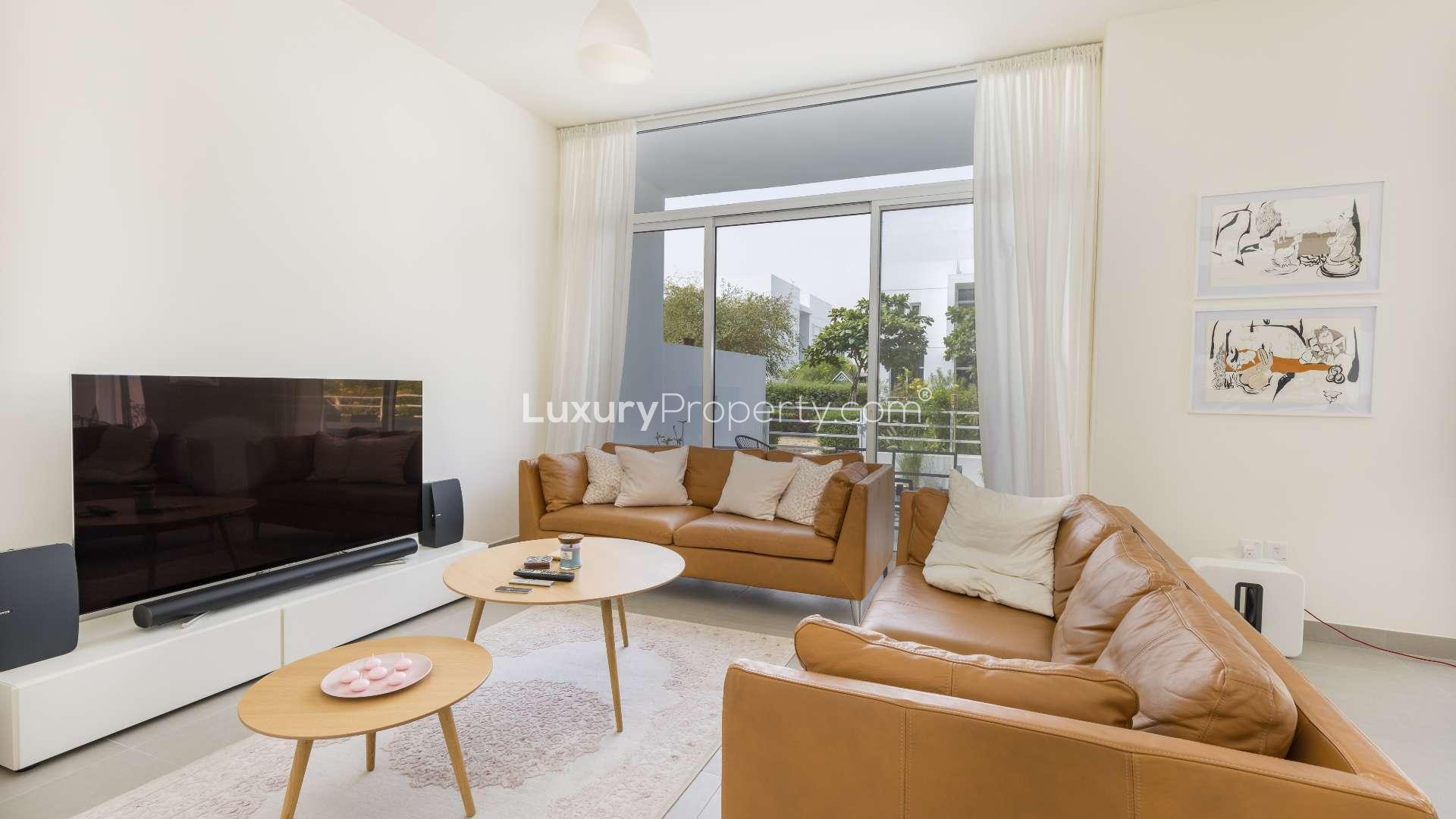 Modern staircase and cozy seating area in Arabella townhouse, Mudon community