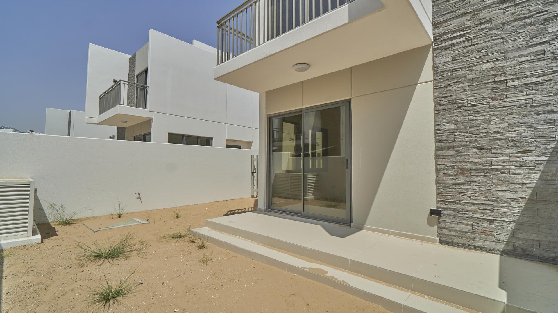 Stunning 3-bedroom end unit townhouse exterior in Trixis, Damac Hills 2, for sale