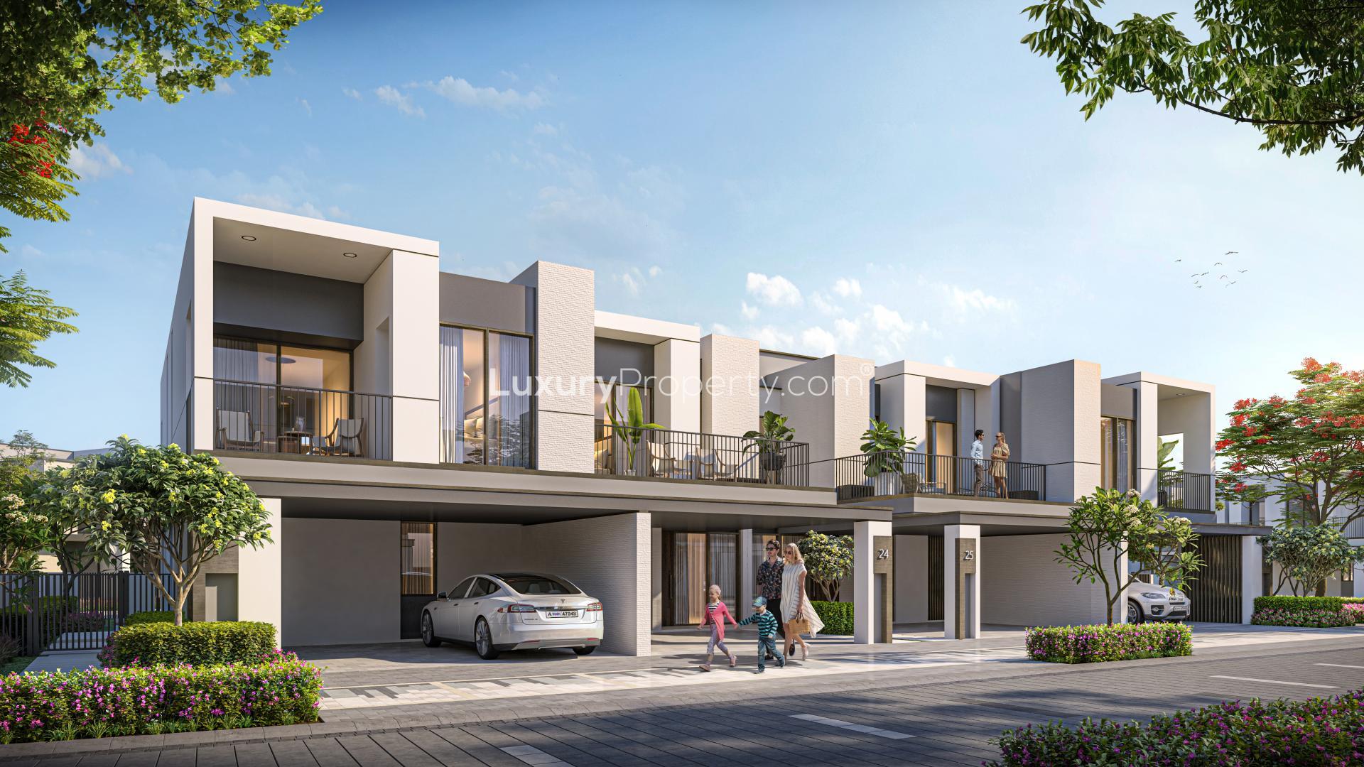 Exclusive 3-bed townhouse in Aura, Tilal Al Ghaf, with modern design and lush surroundings