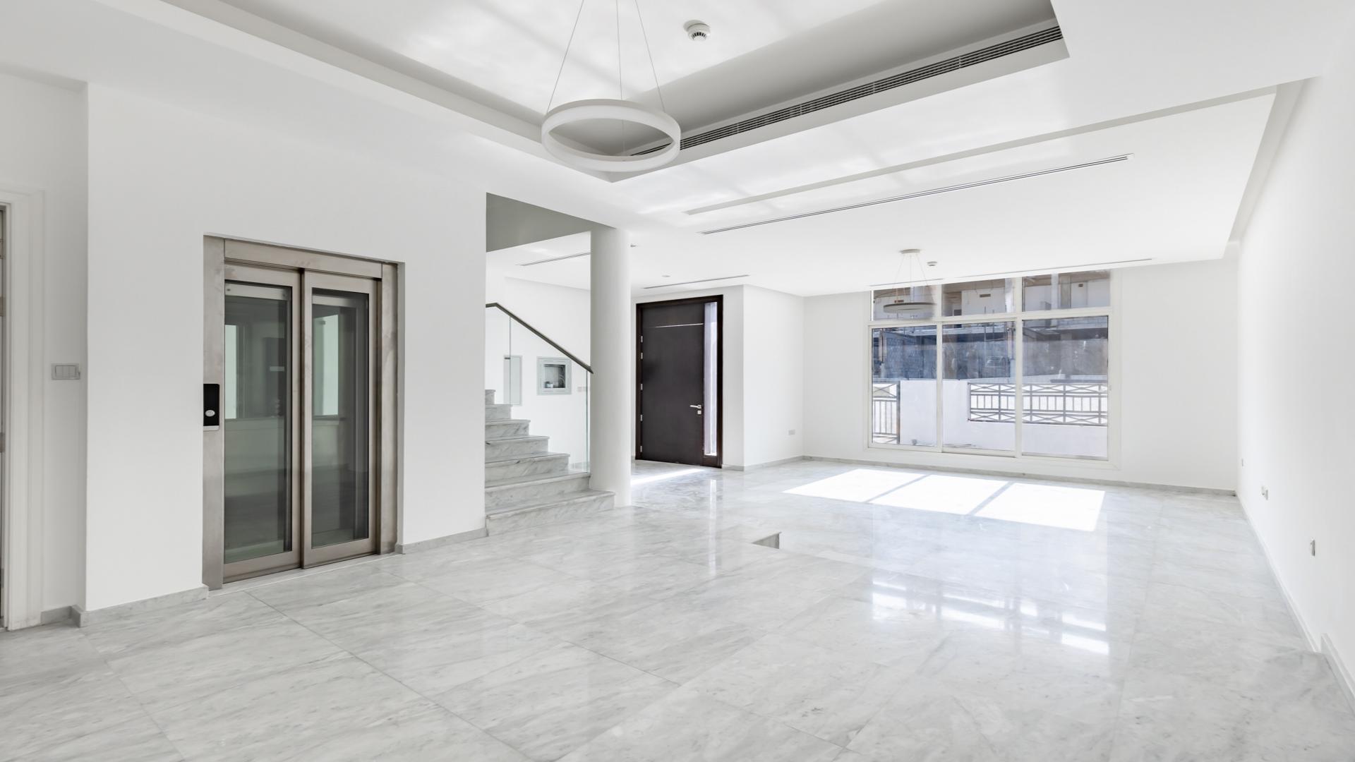 Modern townhouse exterior in District 10, Jumeirah Village Circle, for sale