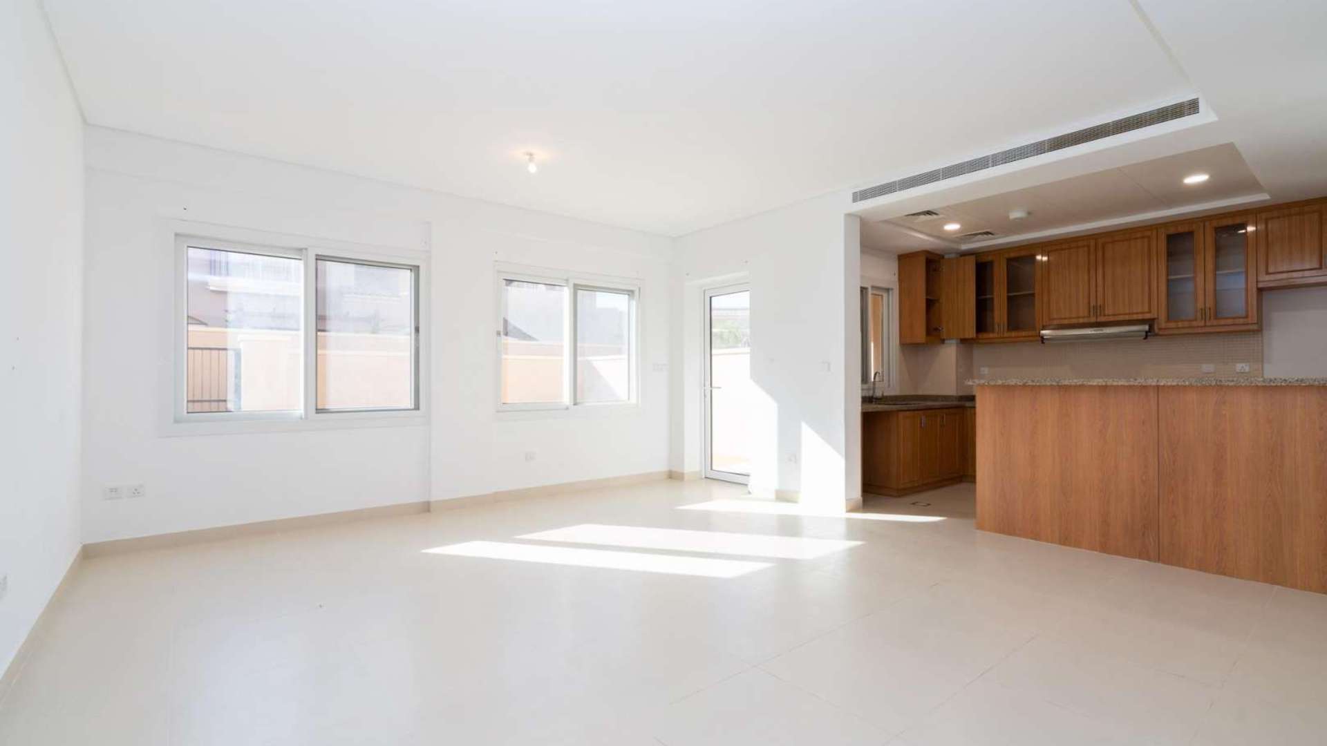 Stunning 3-bedroom townhouse exterior in Bella Casa, Serena community, with landscaped surroundings