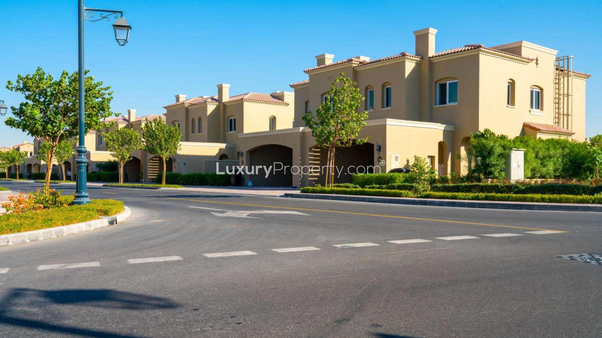 Stunning 3-bedroom townhouse exterior in Bella Casa, Serena, with lush landscaping