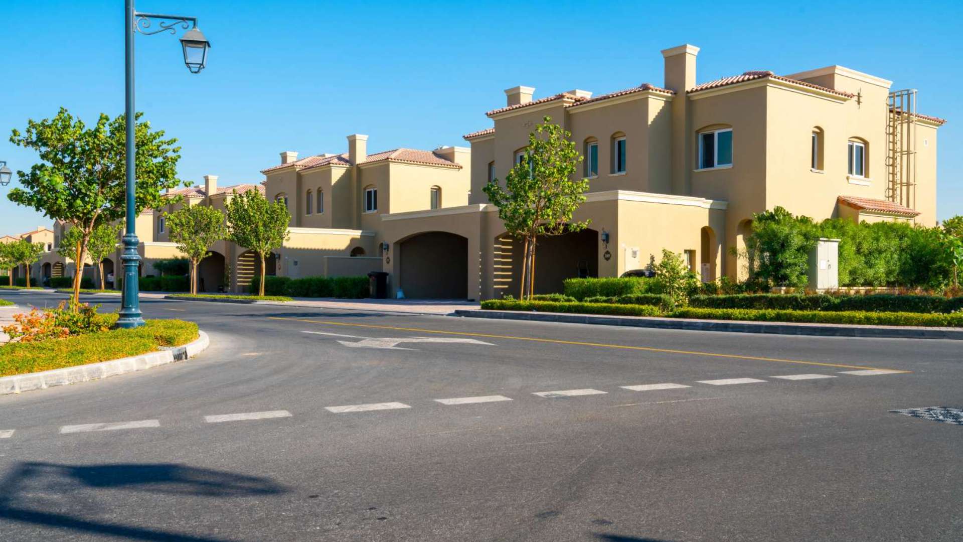 Stunning 3-bedroom townhouse exterior in Bella Casa, Serena, with lush landscaping