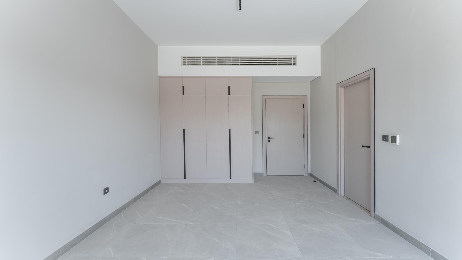 Brand-new townhouse bedroom with built-in wardrobe in District 7, Mohammed Bin Rashid City