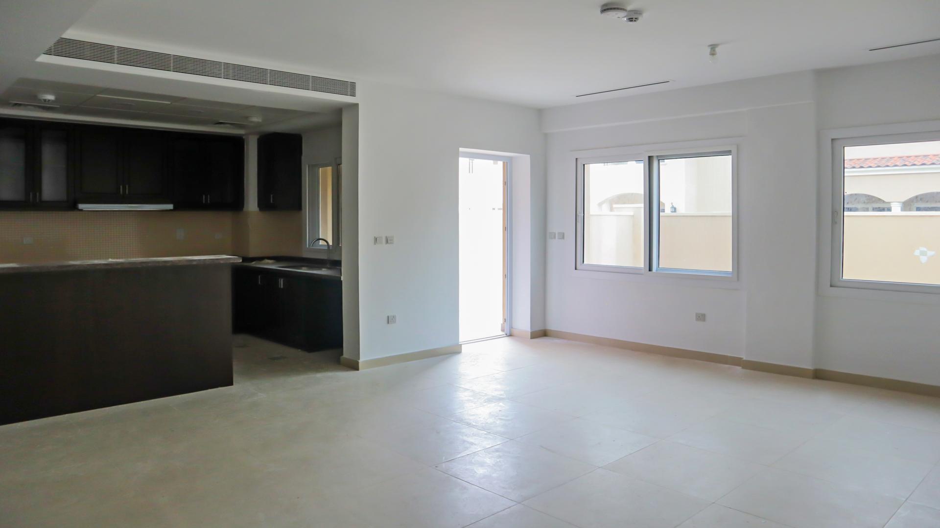 Brand new Serena townhouse interior with large windows, bright open space, Casa Viva Dubai