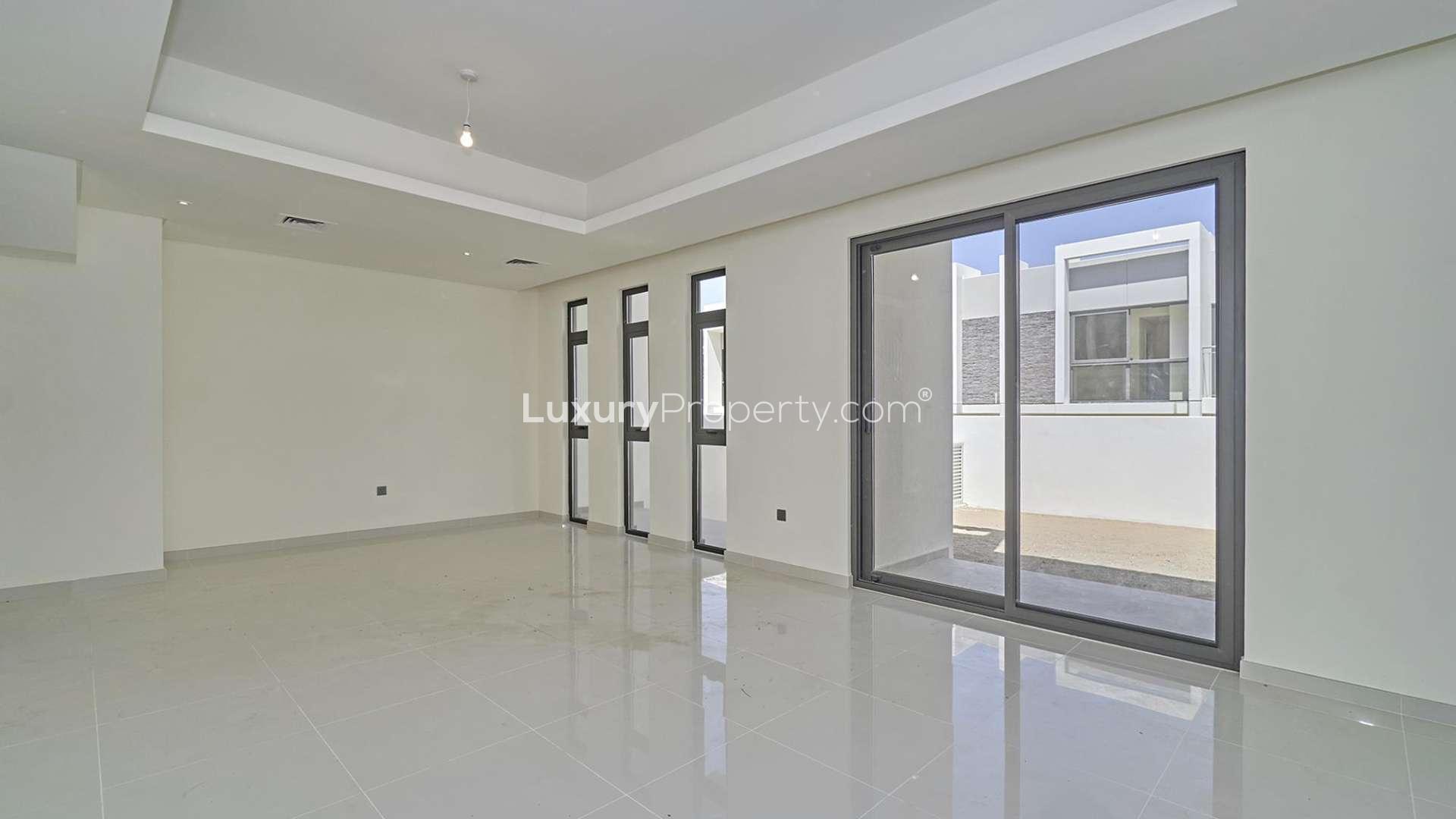 Stylish three-bedroom townhouse exterior in Claret, Damac Hills 2, Akoya community for sale