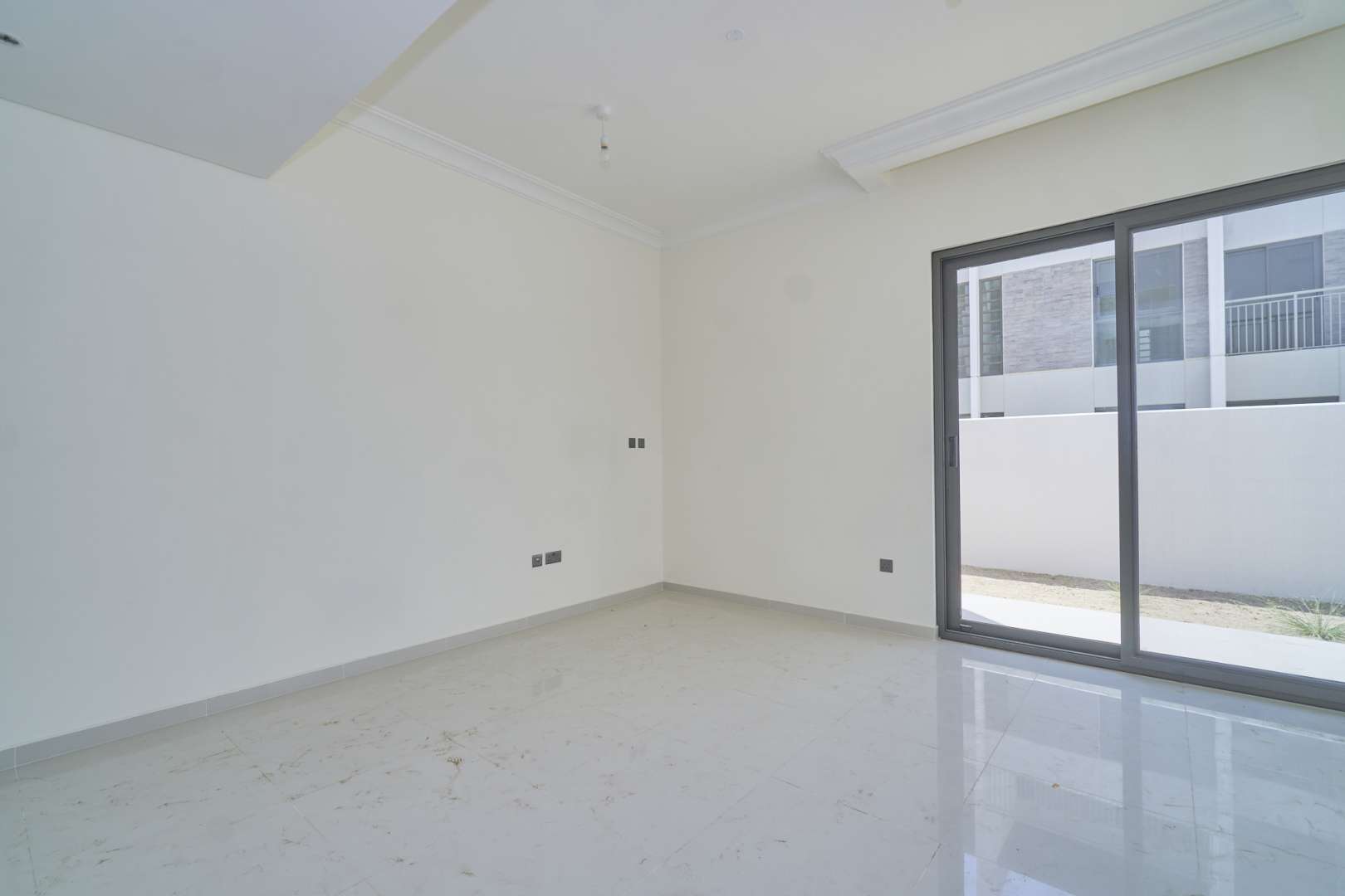 Elegant three-bedroom townhouse exterior in Claret, Damac Hills 2, for sale