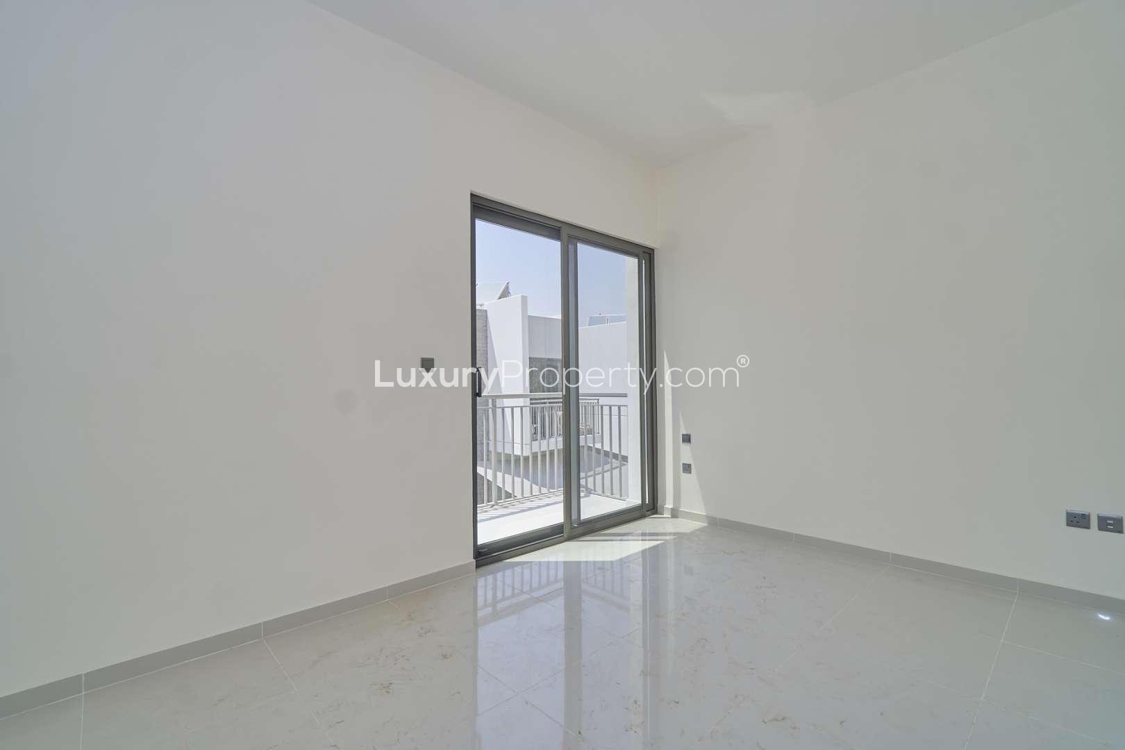 Balcony view of townhouses in Claret, Damac Hills 2, Akoya community, for sale