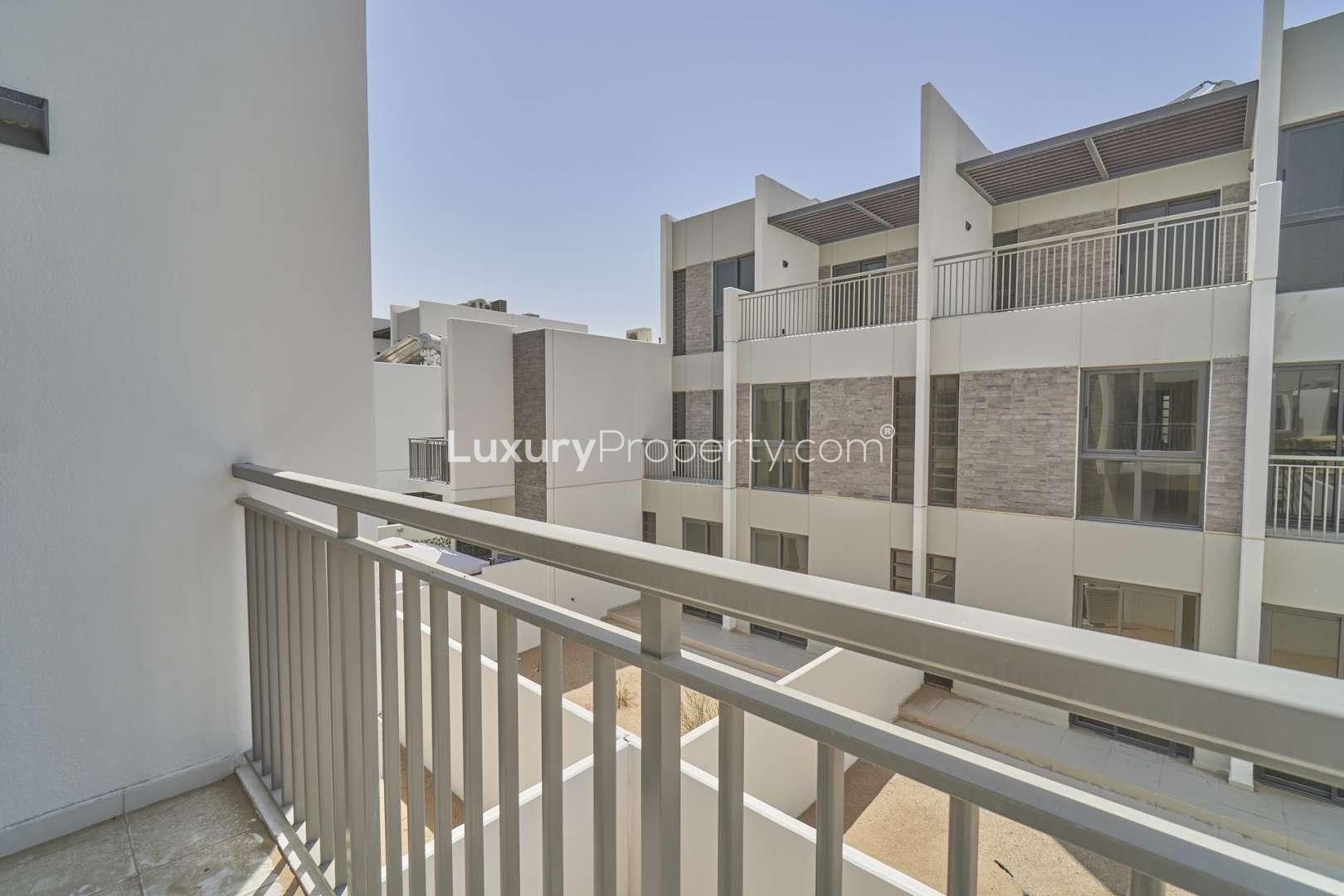 Balcony view of modern townhouse in Claret, Damac Hills 2, for sale
