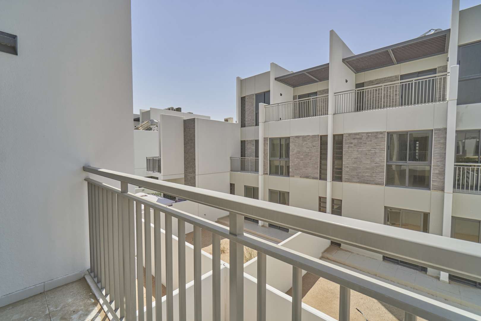 Balcony view of modern townhouse in Claret, Damac Hills 2, for sale