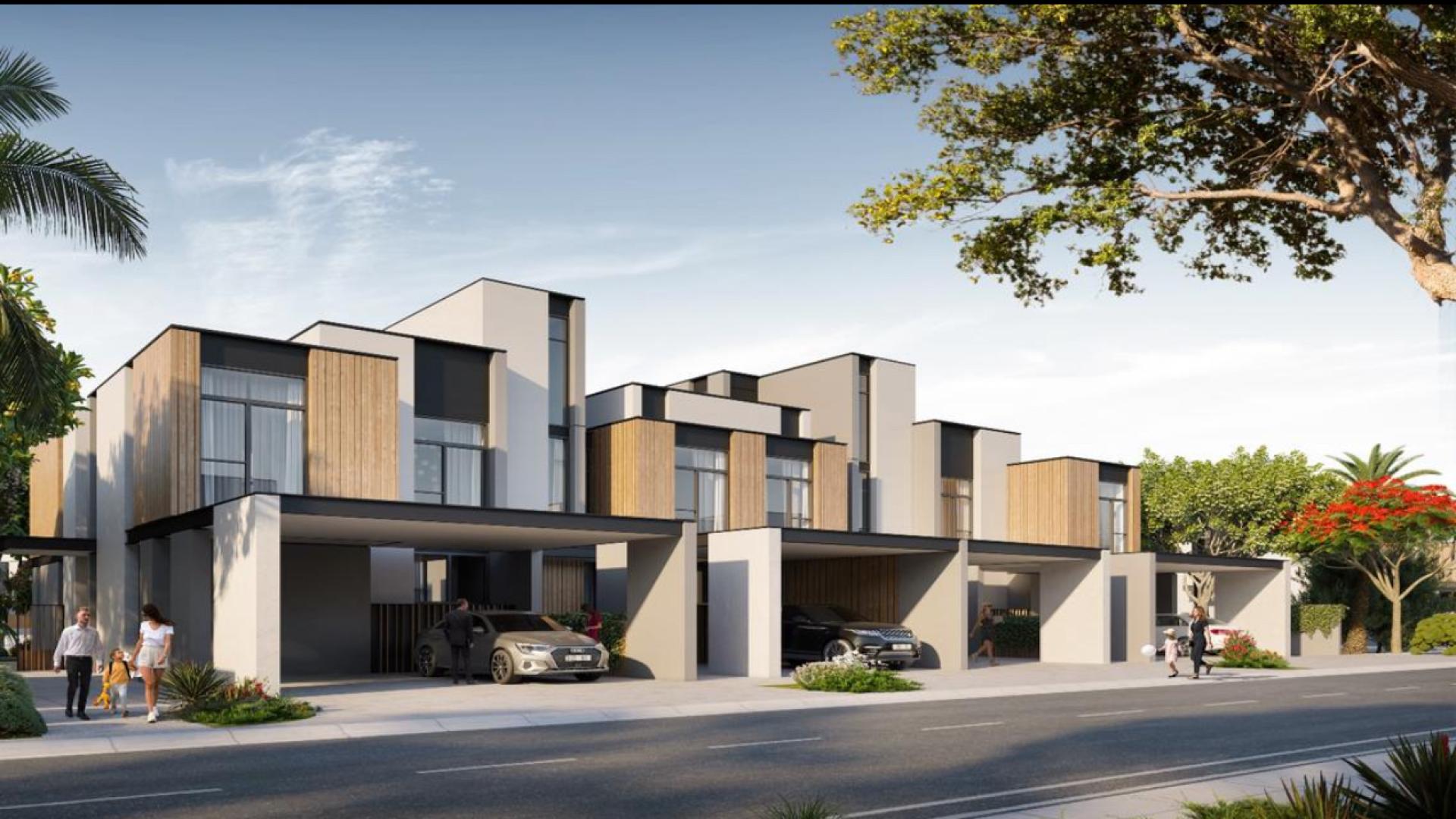 Modern kitchen and dining area in Mudon Al Ranim 7 townhouse for sale