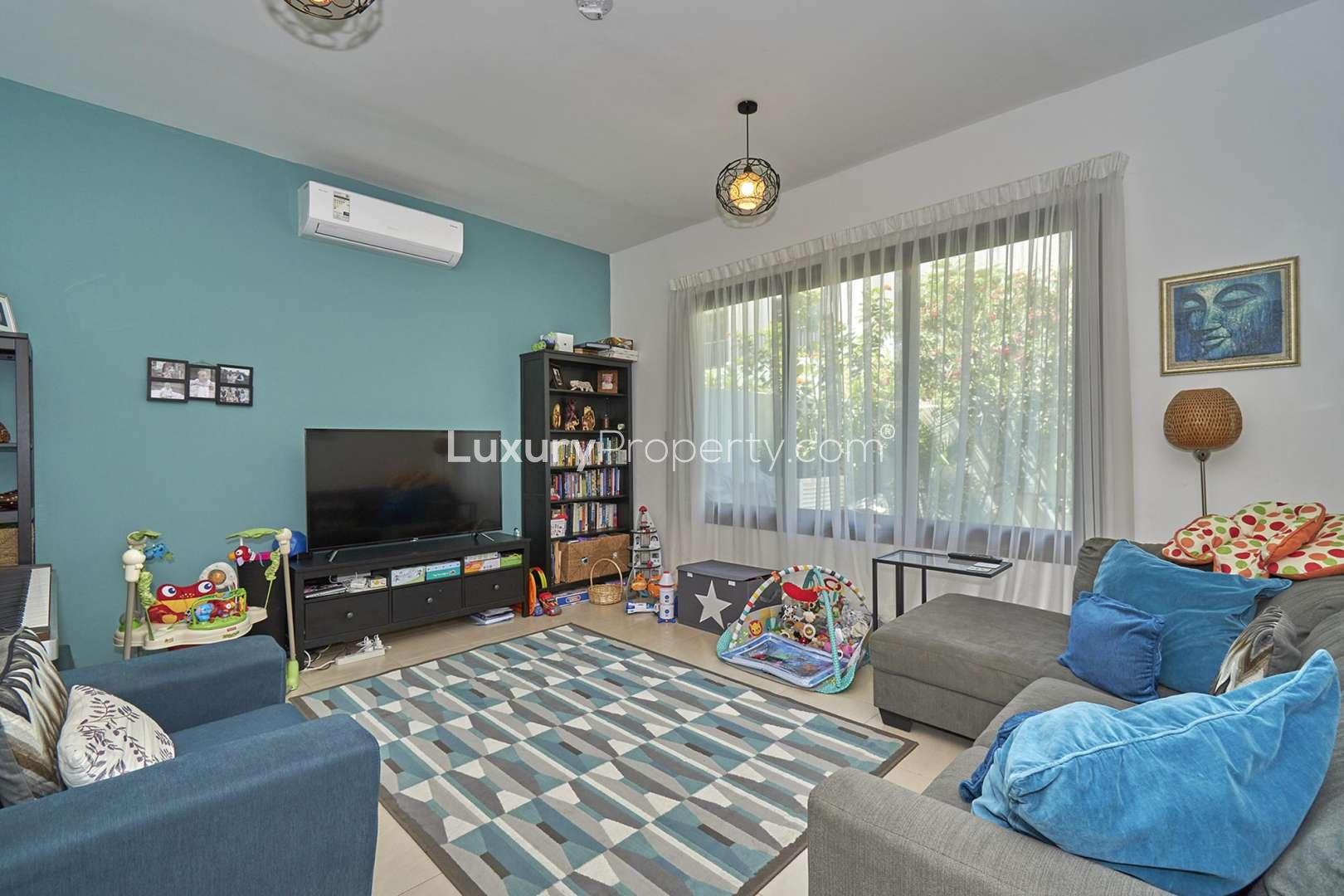 Cozy living room in 3-bedroom townhouse, Hayat Townhouses, Town Square, Dubai for rent
