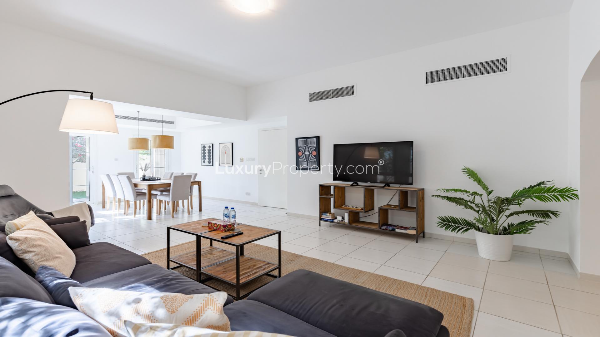 Living room and dining area in 3-bedroom villa, The Lakes, Zulal community, for sale