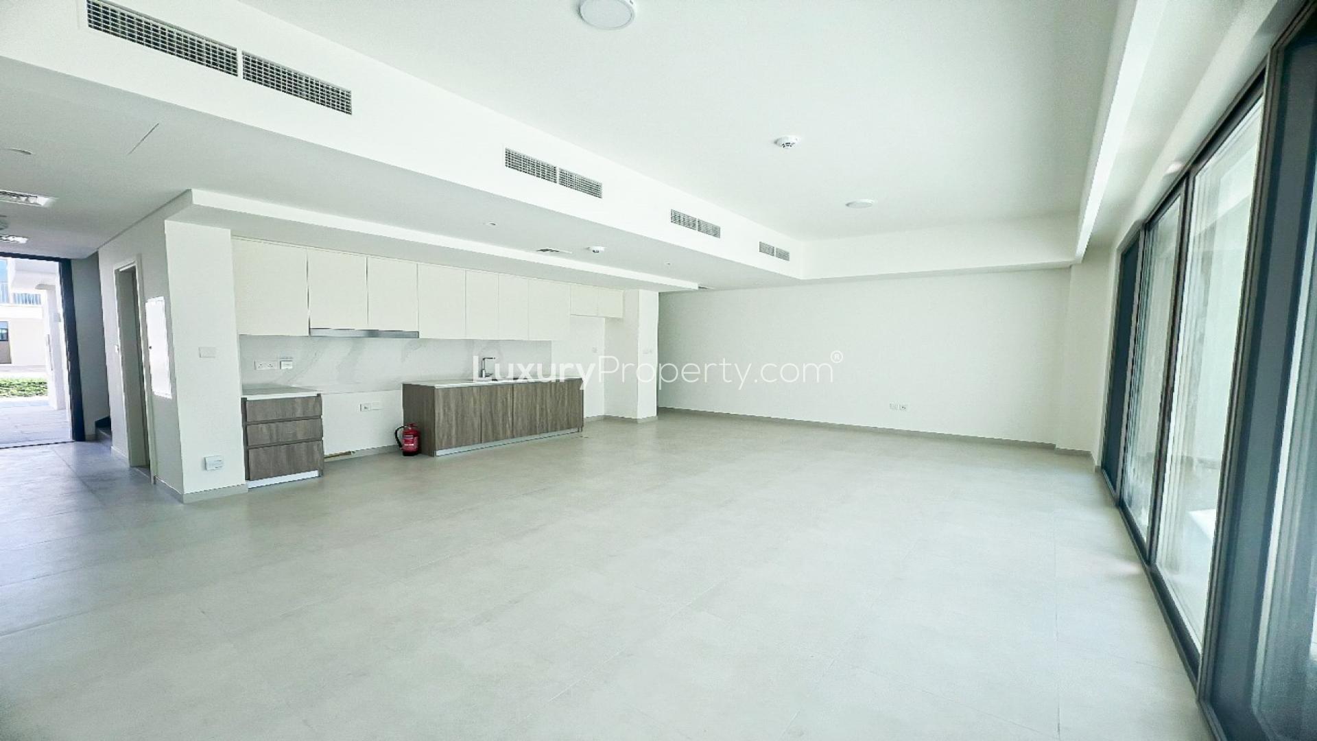 Open-plan kitchen and living area in 3-bedroom townhouse at The Valley, Talia community