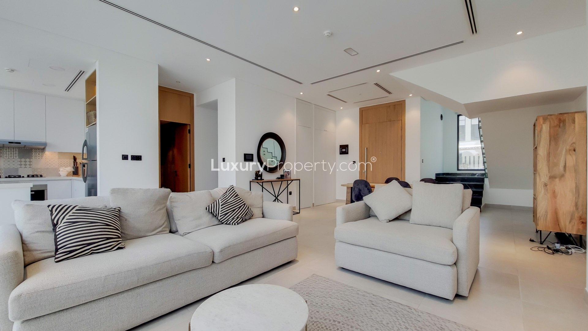 Modern townhouse exterior in Jumeirah Luxury, Jumeirah Golf Estates, available for rent