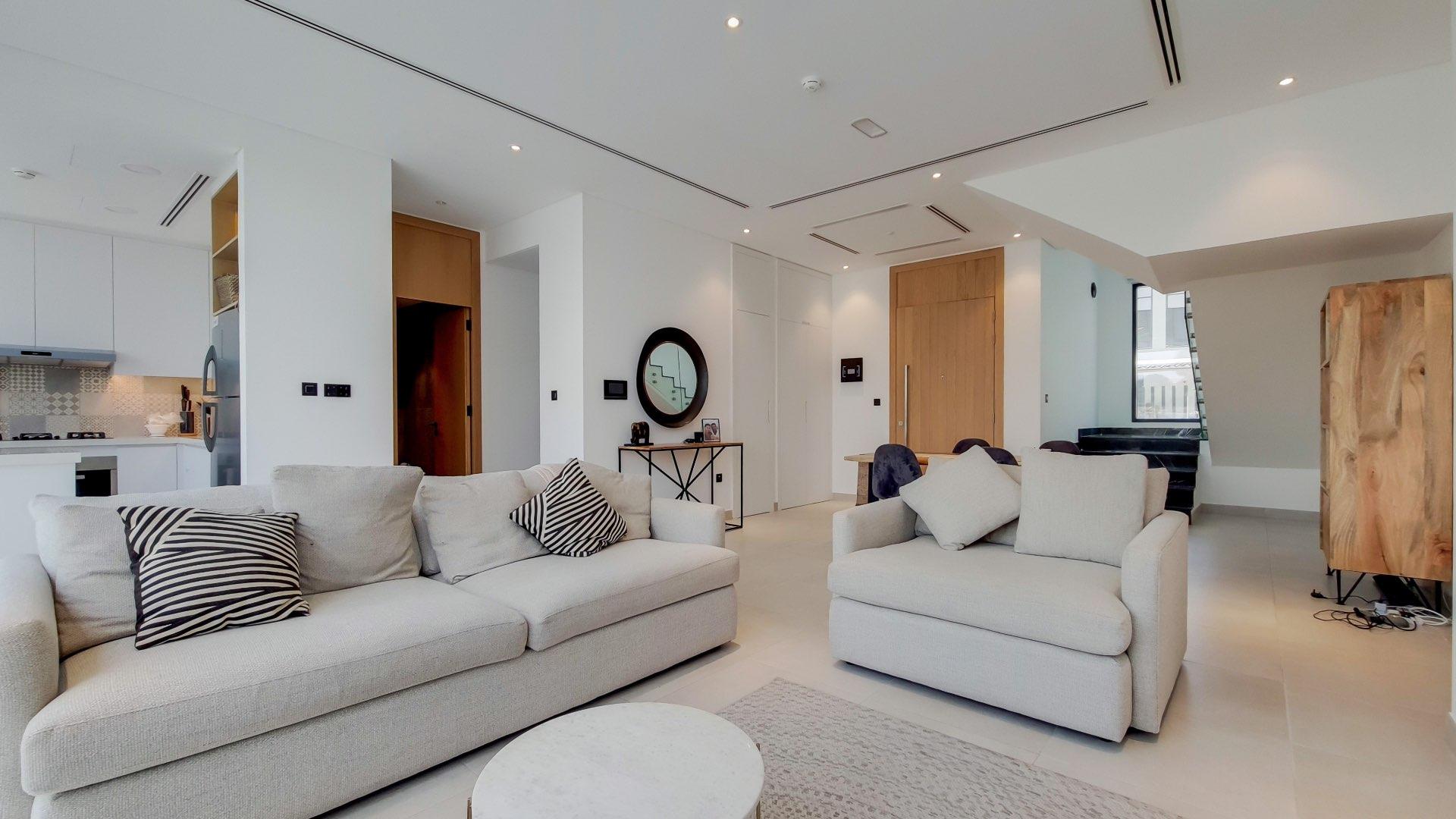 Modern townhouse exterior in Jumeirah Luxury, Jumeirah Golf Estates, available for rent