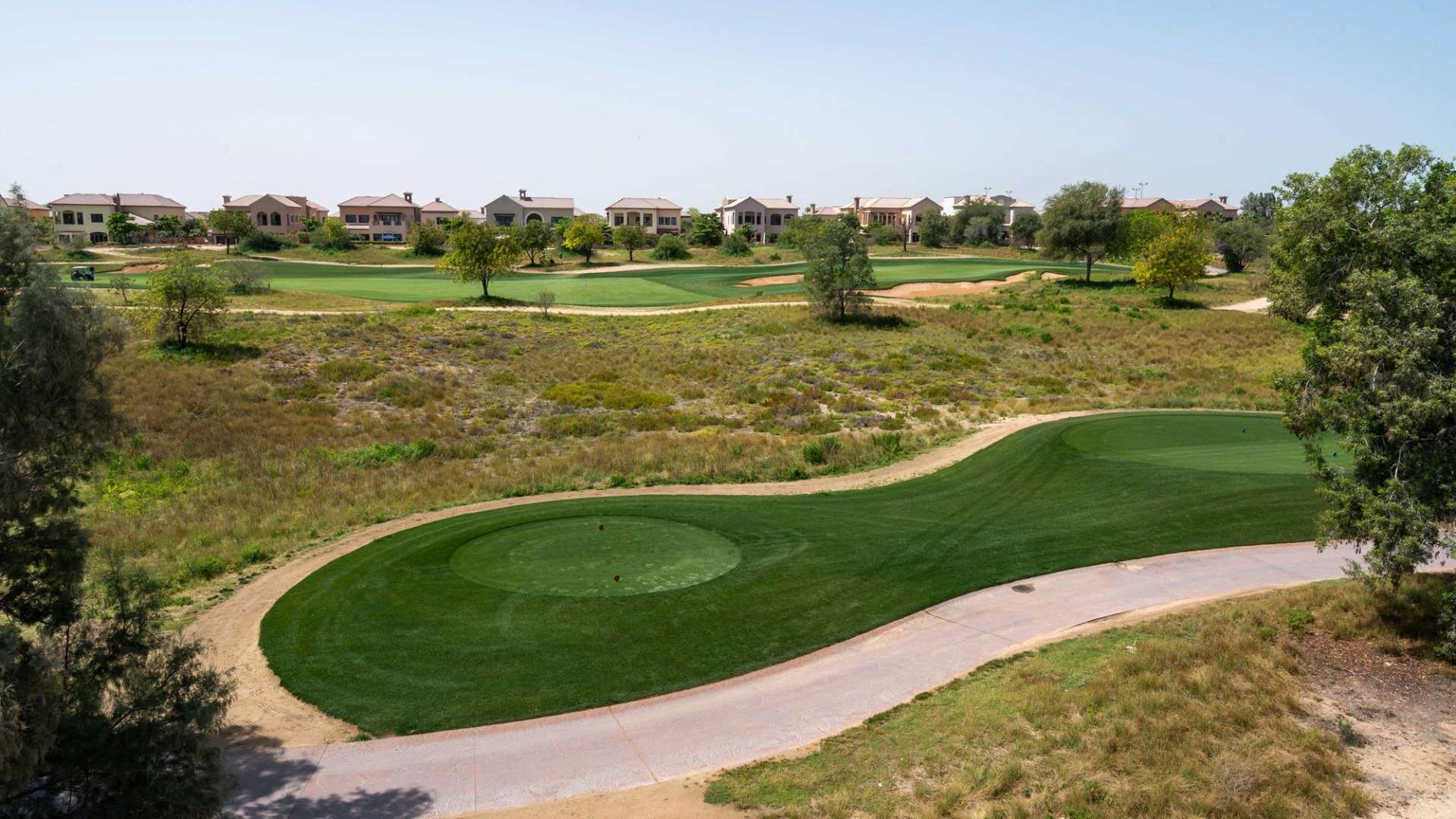 Spacious living room with large windows in Jumeirah Luxury townhouse, Jumeirah Golf Estates