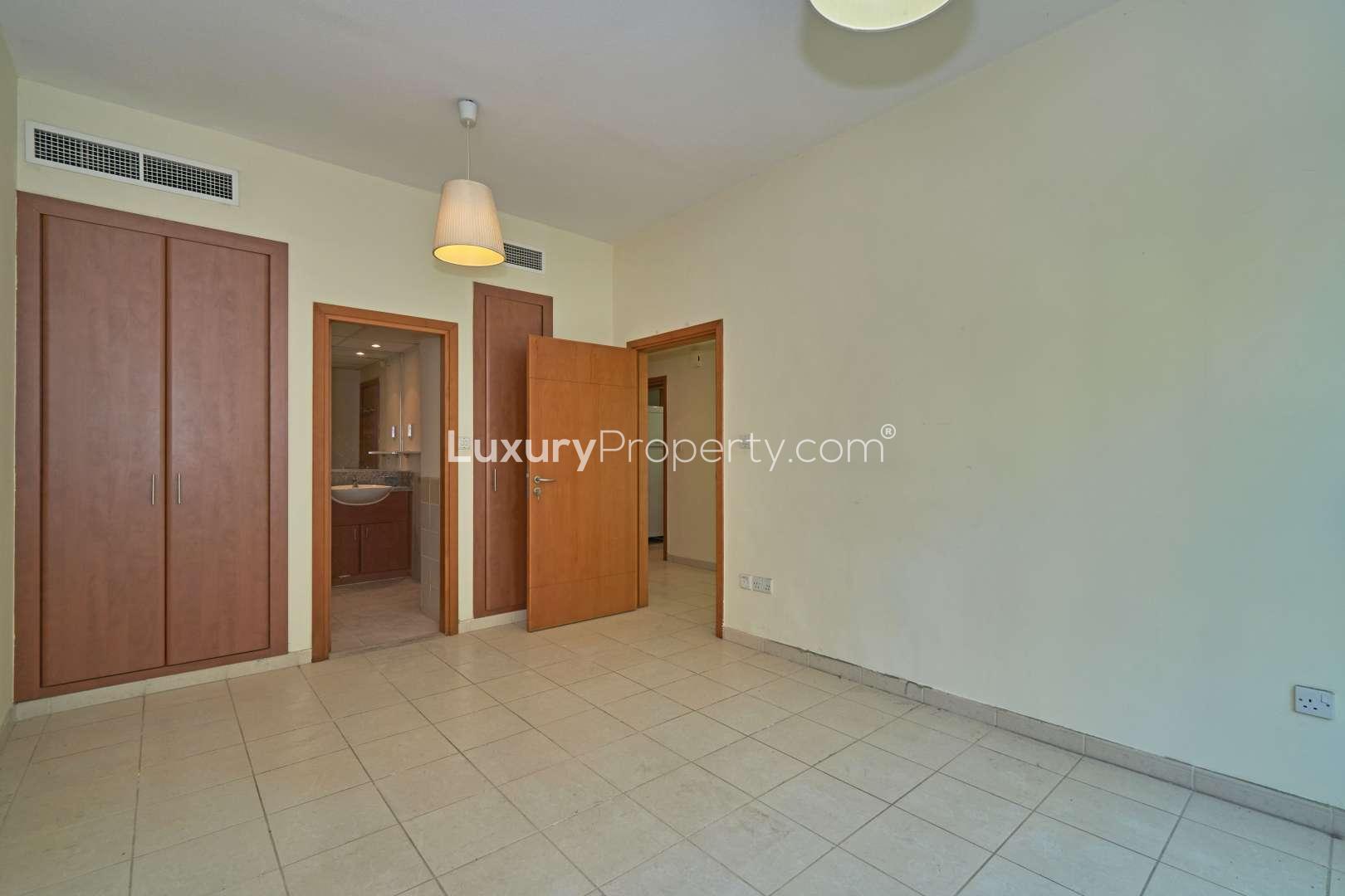 Balcony view from townhouse in Maple, Dubai Hills Estate overlooking greenery and neighboring buildings