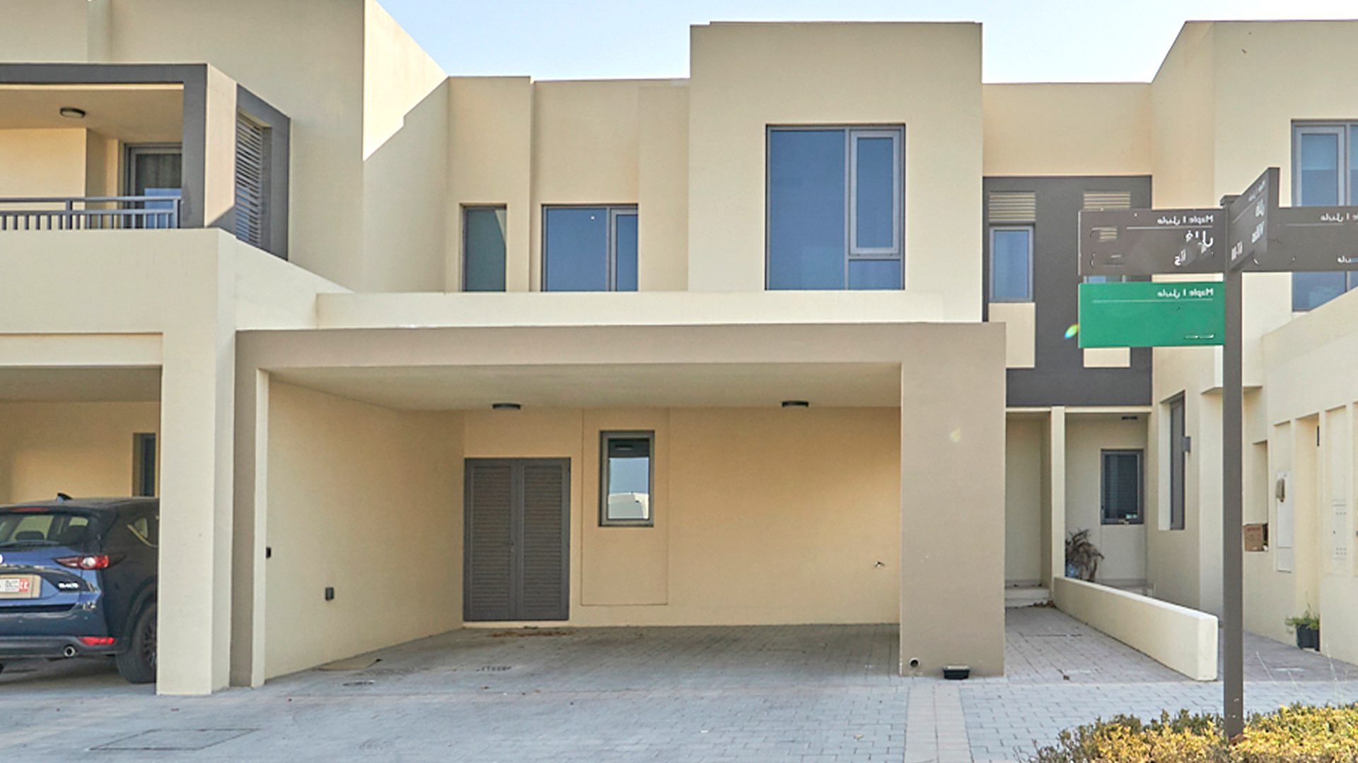 Row of modern townhouses in Maple at Dubai Hills Estate, family-friendly community
