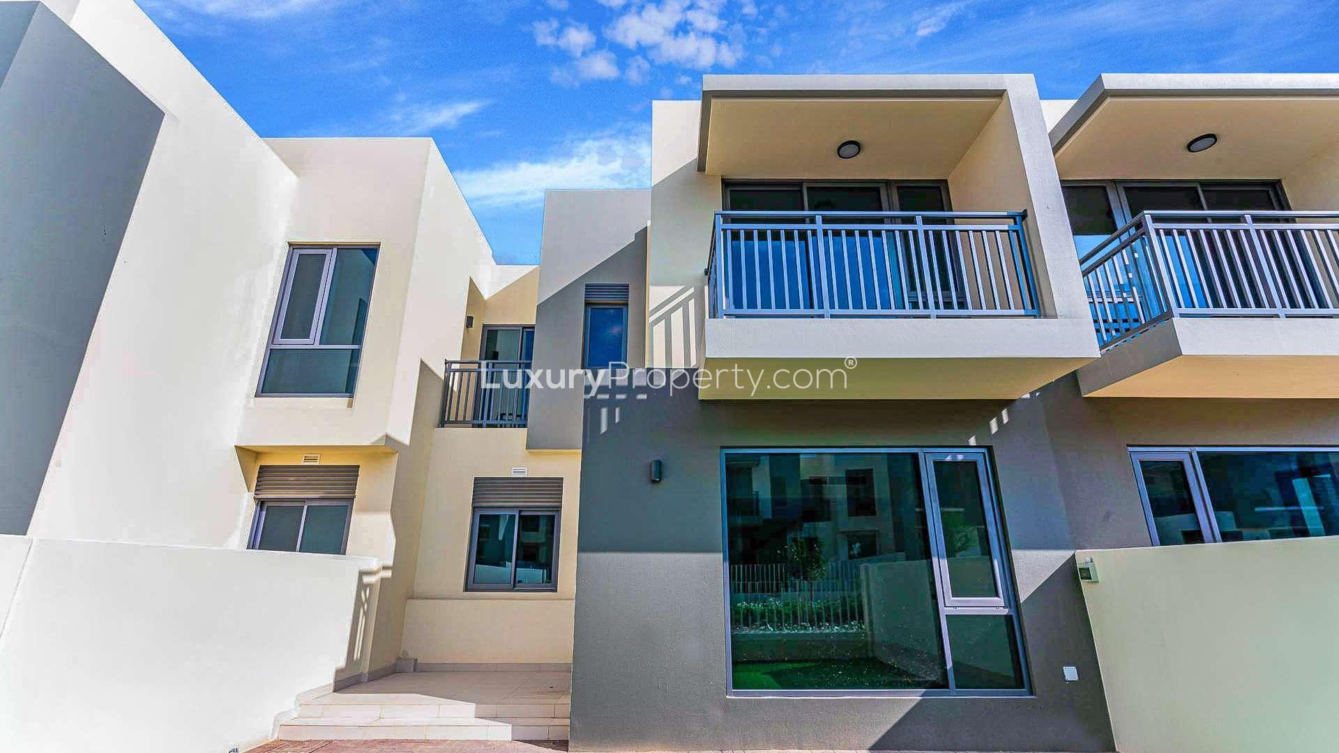 Modern townhouse exterior in Maple, Dubai Hills Estate; 3-bedroom villa for sale