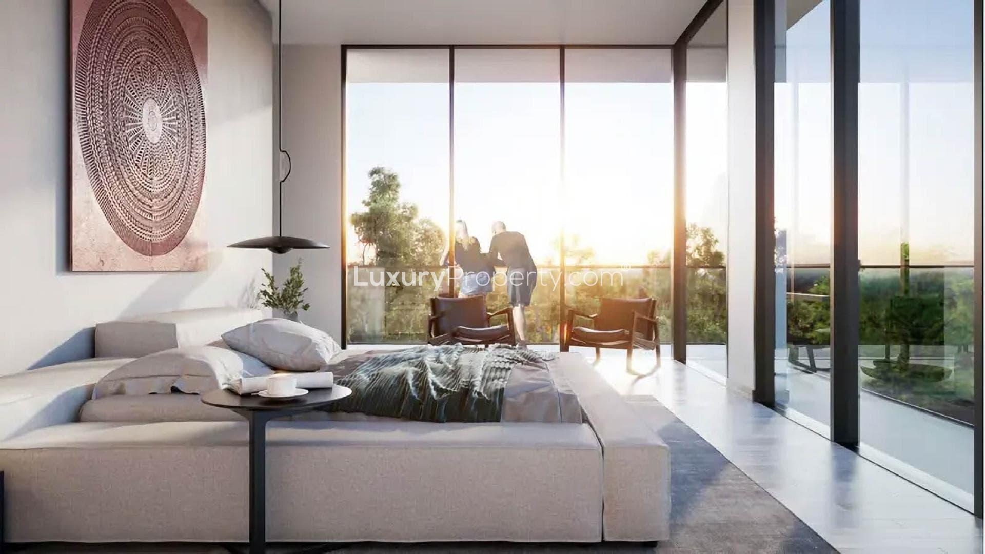 Modern townhouse exterior in Jouri Hills, Jumeirah Golf Estates, prime location for sale