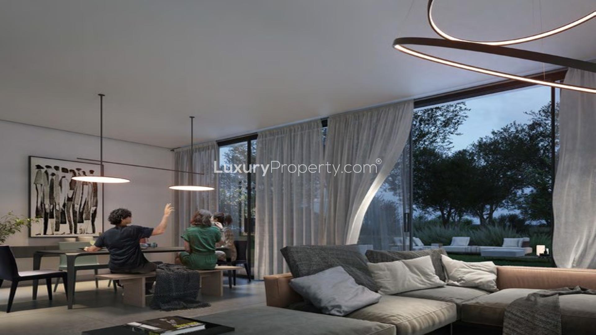 Modern townhouse exterior in Jouri Hills, Jumeirah Golf Estates, prime location for sale