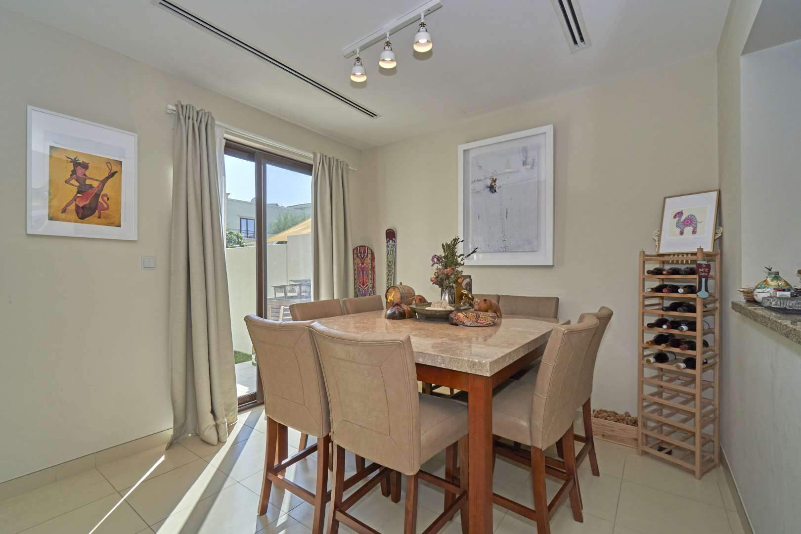 Modern living room in 3-bedroom townhouse for sale in Mira 4, Reem community