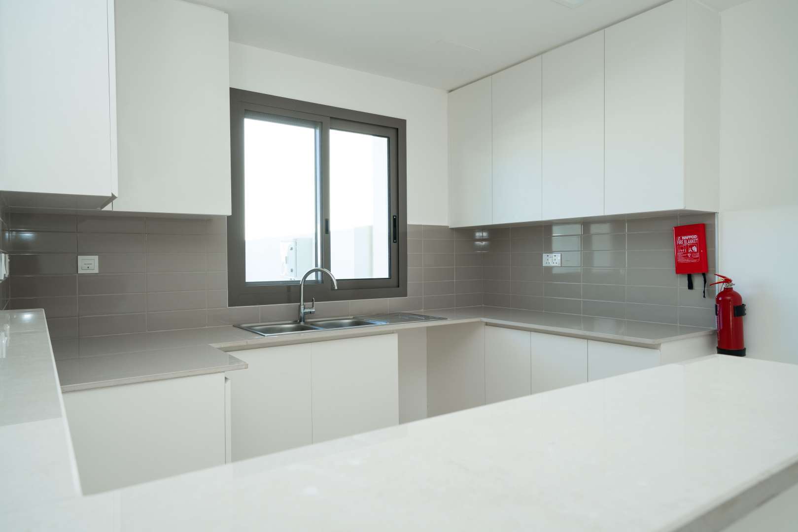 Playground in Naseem Town Square townhouse community, showcasing residential properties for sale