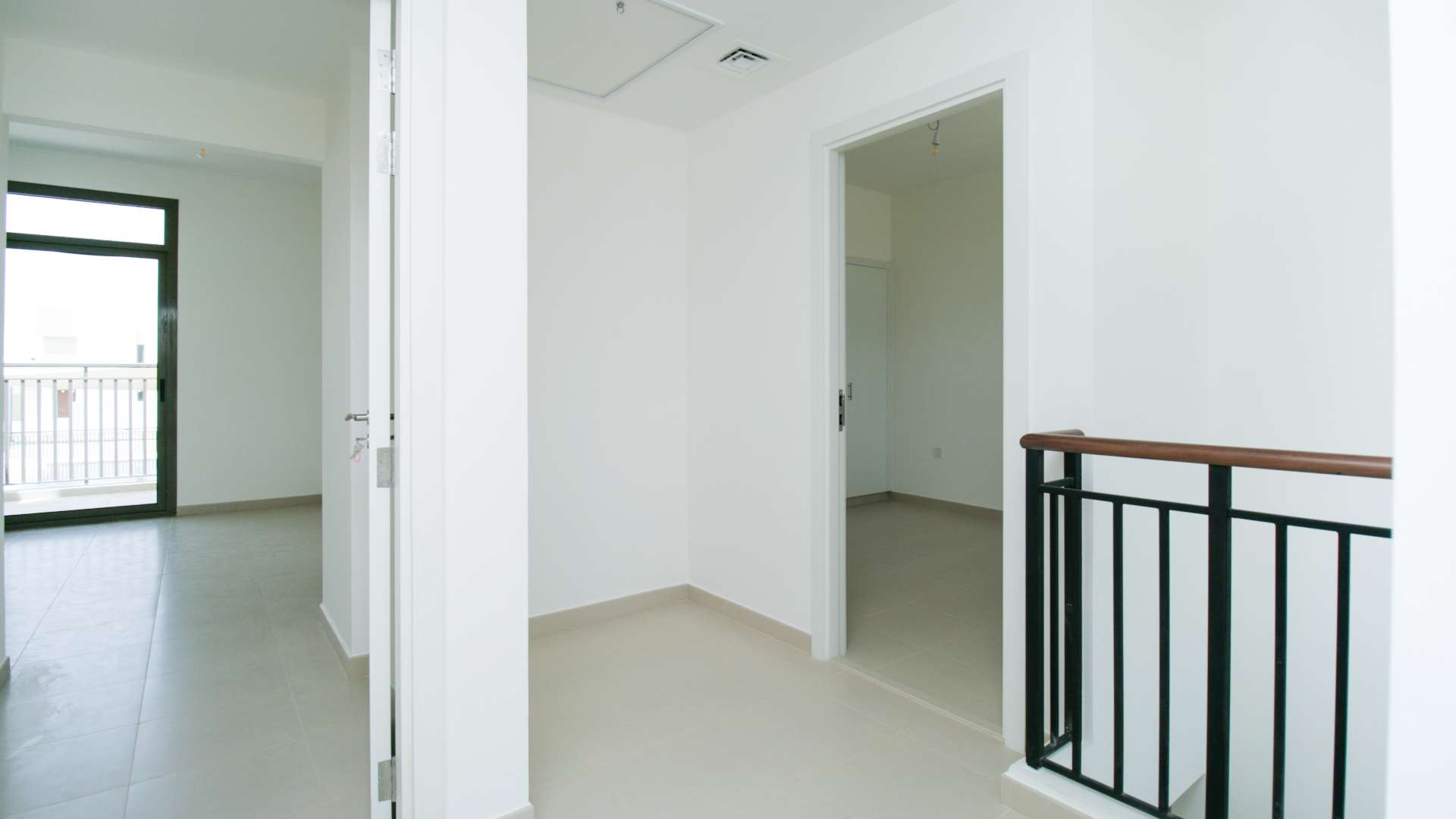 Modern kitchen interior in 3-bedroom townhouse, Noor Townhouses, Town Square, for sale