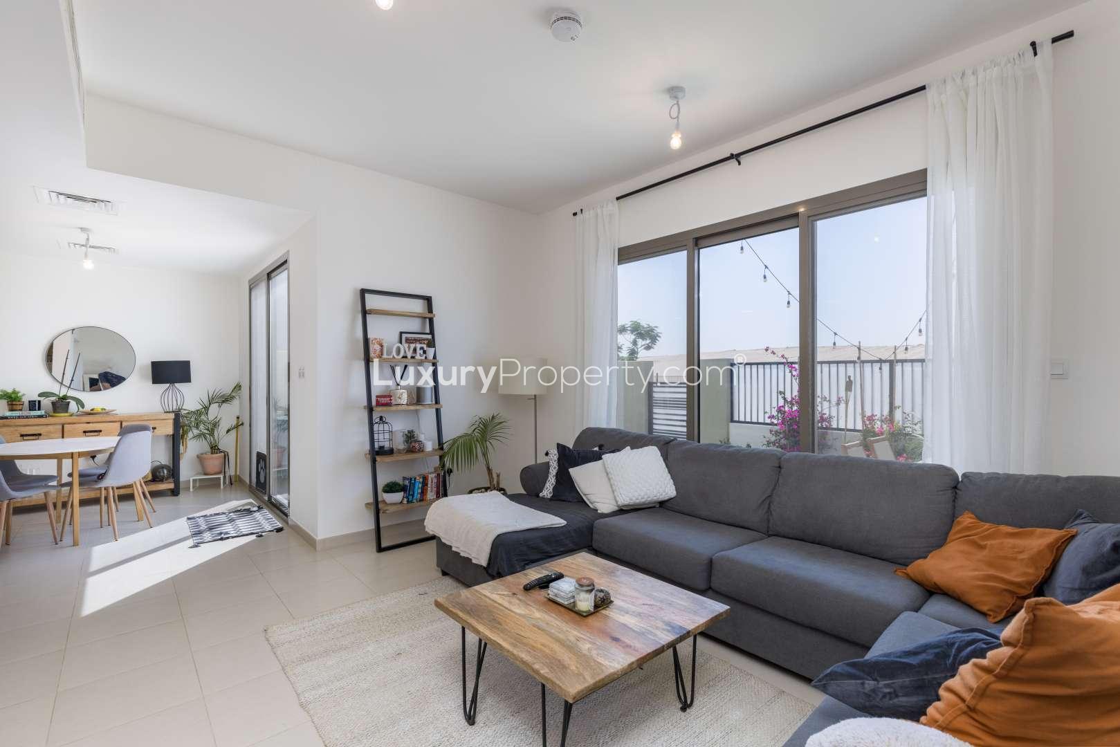 Modern kitchen and dining area in 3-bedroom townhouse, Noor Town Square, for sale