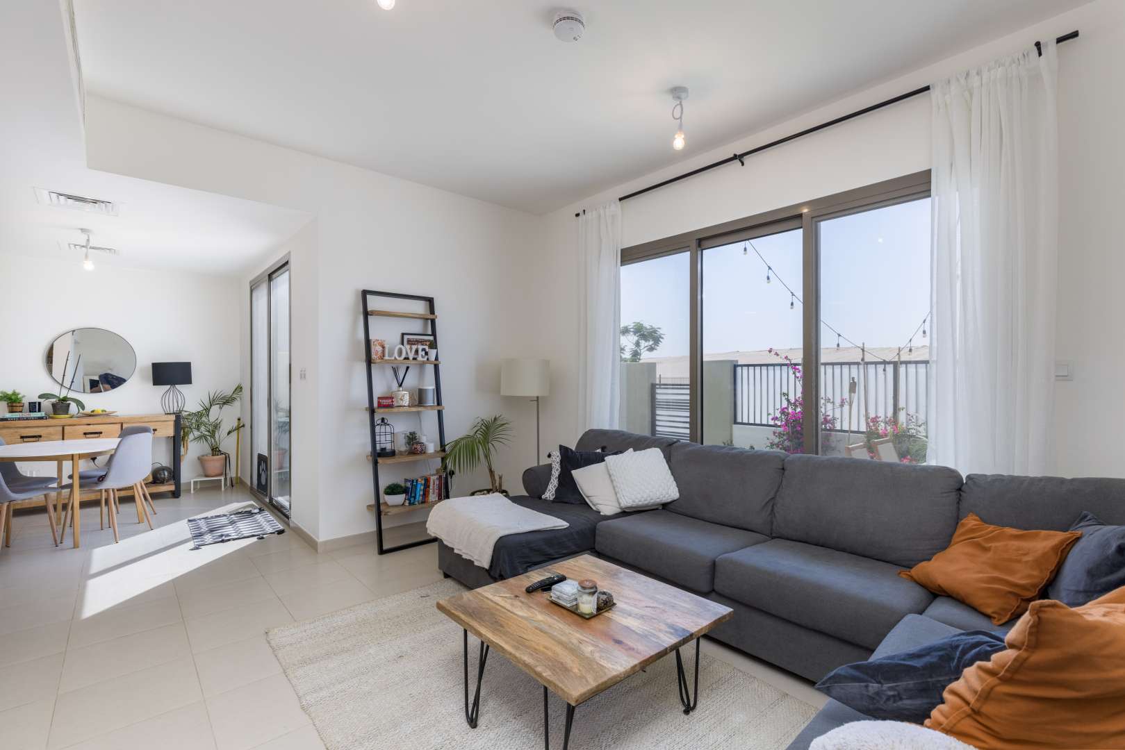 Modern kitchen and dining area in 3-bedroom townhouse, Noor Town Square, for sale