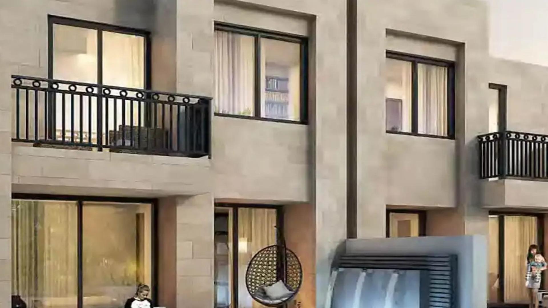 3-bedroom townhouse exterior with balcony, Damac Hills 2, Victoria 2 community, for sale