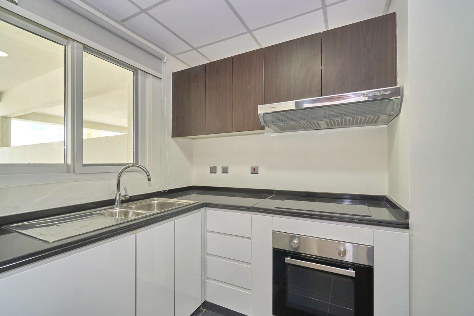 Modern kitchen in fully furnished 3-bedroom townhouse, Pacifica, Akoya by DAMAC Hills 2