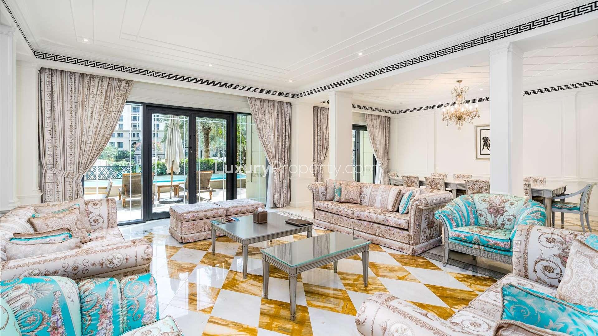 Elegant hallway in Palazzo Versace townhouse, Culture Village, featuring marble flooring and modern railing